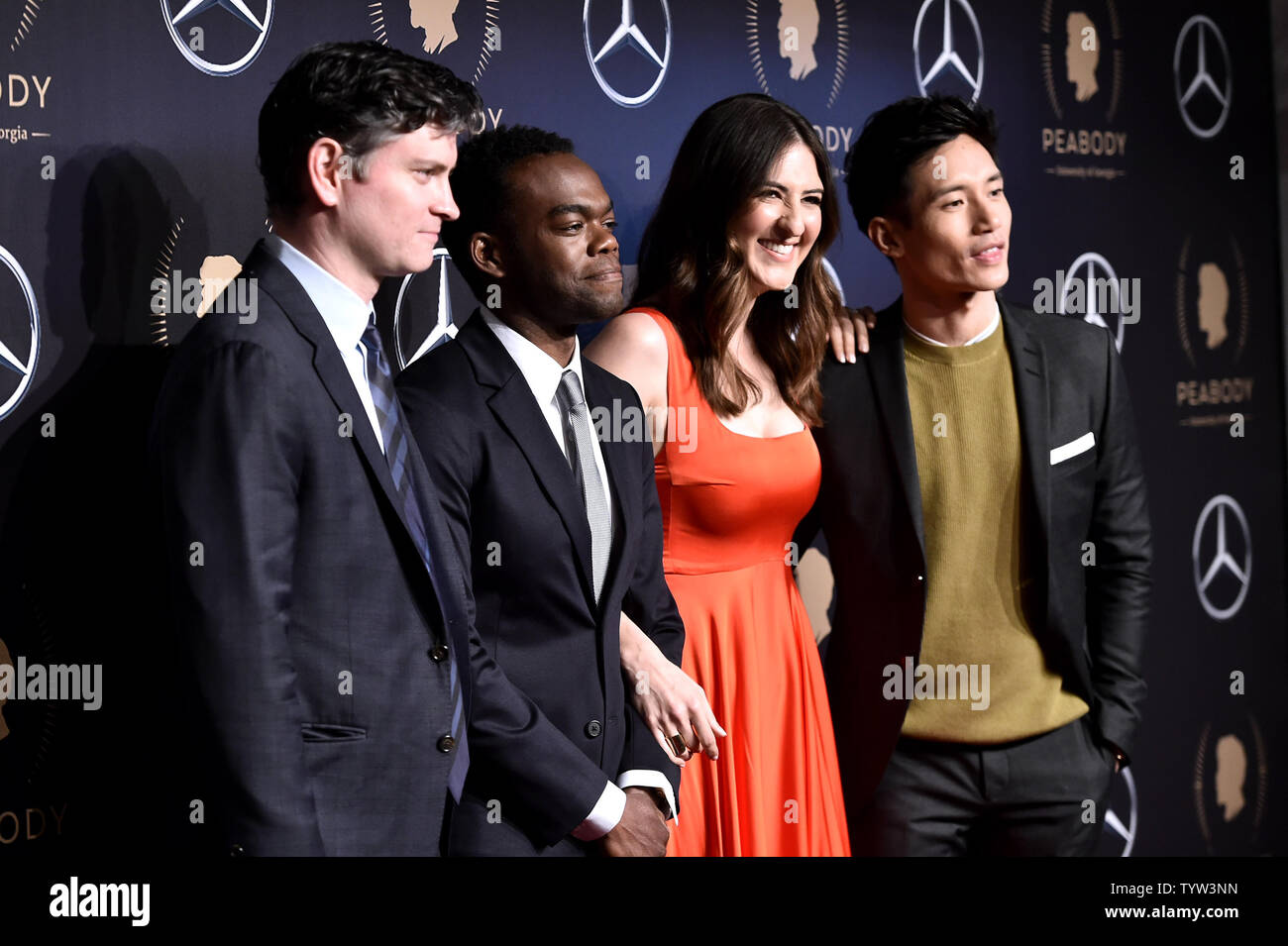 Michael Schur, D'Arcy Carden, Manny Jacinto and William Jackson Harper arrive in the press room with an award at the 78th Annual Peabody Awards Ceremony at Cipriani, Wall Street on May 18, 2019 in New York City.     Photo by Steven Ferdman/UPI Stock Photo