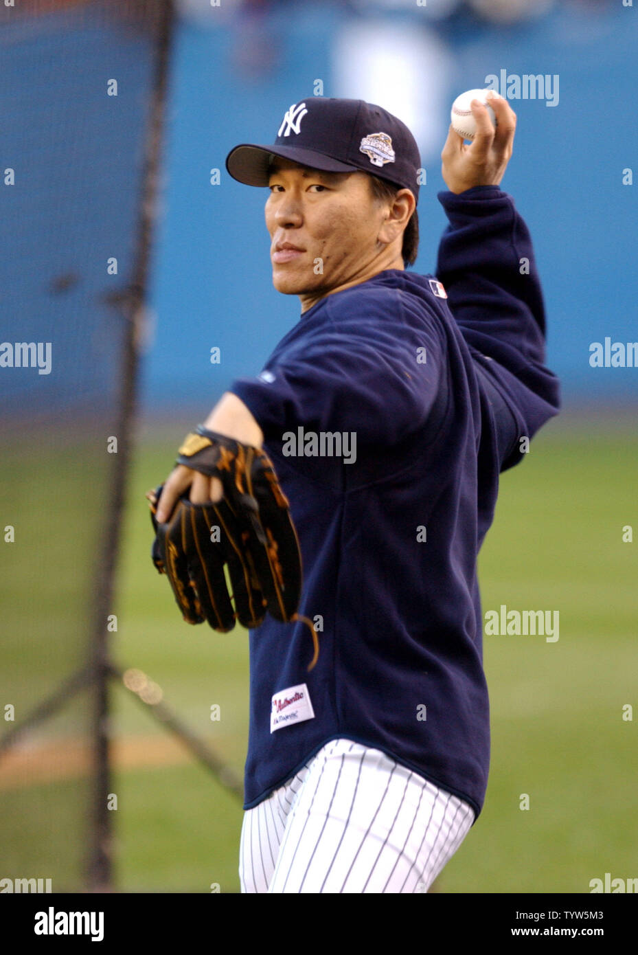 The New York Yankees' Hideki Matsui warms up before Game 1 of the World Series vs. the Florida Marlins at Yankee Stadium on October 18, 2003.   (UPI/Roger L. Wollenberg) Stock Photo