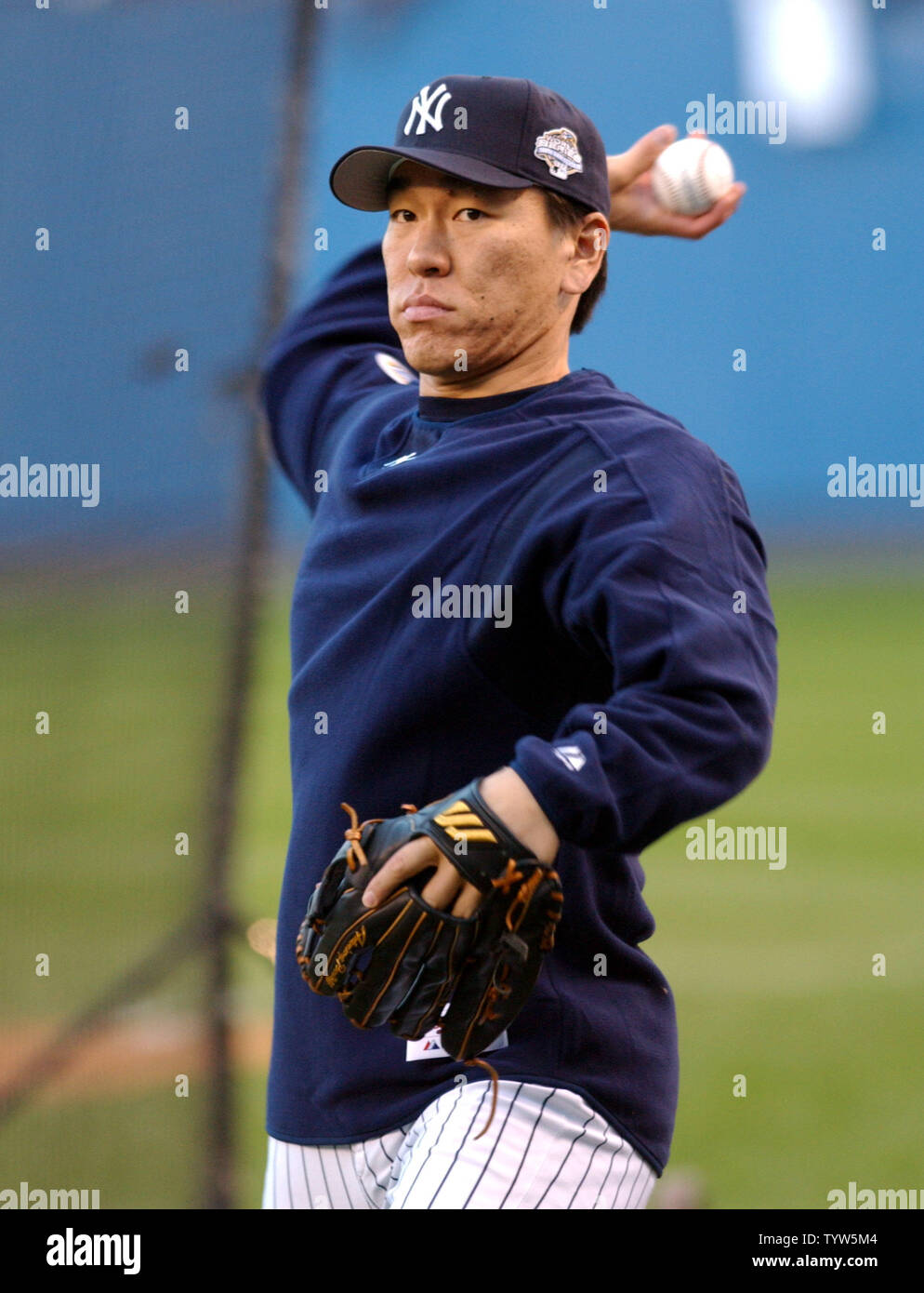 The New York Yankees' Hideki Matsui warms up before Game 1 of the World Series vs. the Florida Marlins at Yankee Stadium on October 18, 2003.   (UPI/Roger L. Wollenberg) Stock Photo
