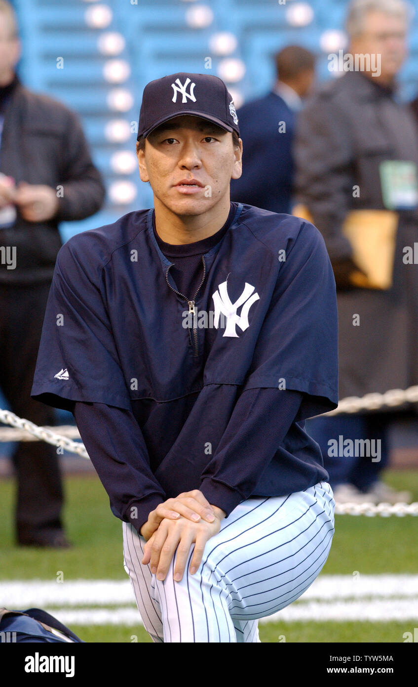 The New York Yankees' Hideki Matsui warms up before Game 2 of the World Series against the Florida Marlins on October 19, 2003, at Yankee Stadium. The Marlins defeated the Yankees 3-2 in Game 1.    (UPI/Roger L. Wollenberg) Stock Photo