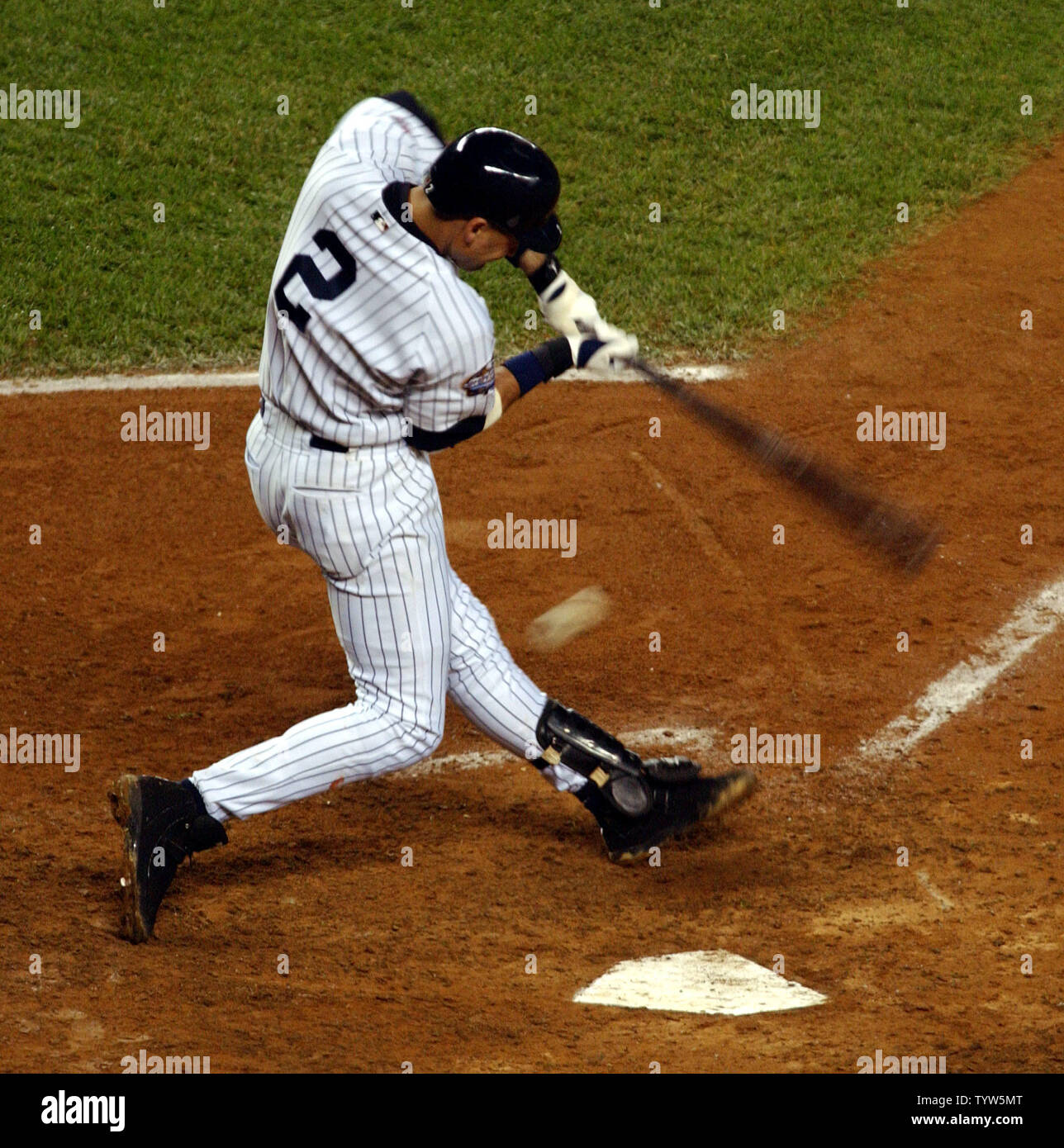 The New York Yankees' Derek Jeter Game fouls a ball off his leg in Game 2 of the World Series against the Florida Marlins on October 19, 2003, at Yankee Stadium. The Yankees defeated the Marlins 6-1.   (UPI/Roger L. Wollenberg) Stock Photo