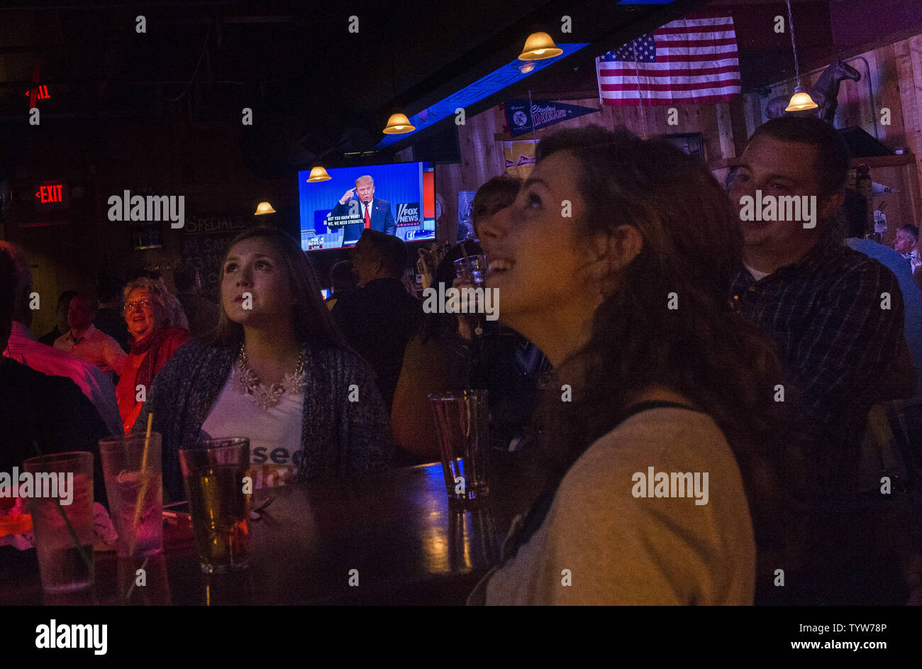 People attend a watch party for the Republican presidential debate at the Harry Buffalo bar in Cleveland, Ohio on August 6, 2015. The top ten candidates, Donald Trump, Jeb Bush, Scott Walker, Mike Huckabee, Ben Carson, Ted Cruz, Marco Rubio, Rand Paul, Chris Christie and John Kasich met in the first prime time debate for the 2016 presidential election while the six other major declared candidates, Rick Santorum, Bobby Jindal, Carly Fiorina, Lindsey Graham, George Pataki, and Jim Gilmore, participated in an earlier debate.  Photo by Kevin Dietsch/UPI Stock Photo