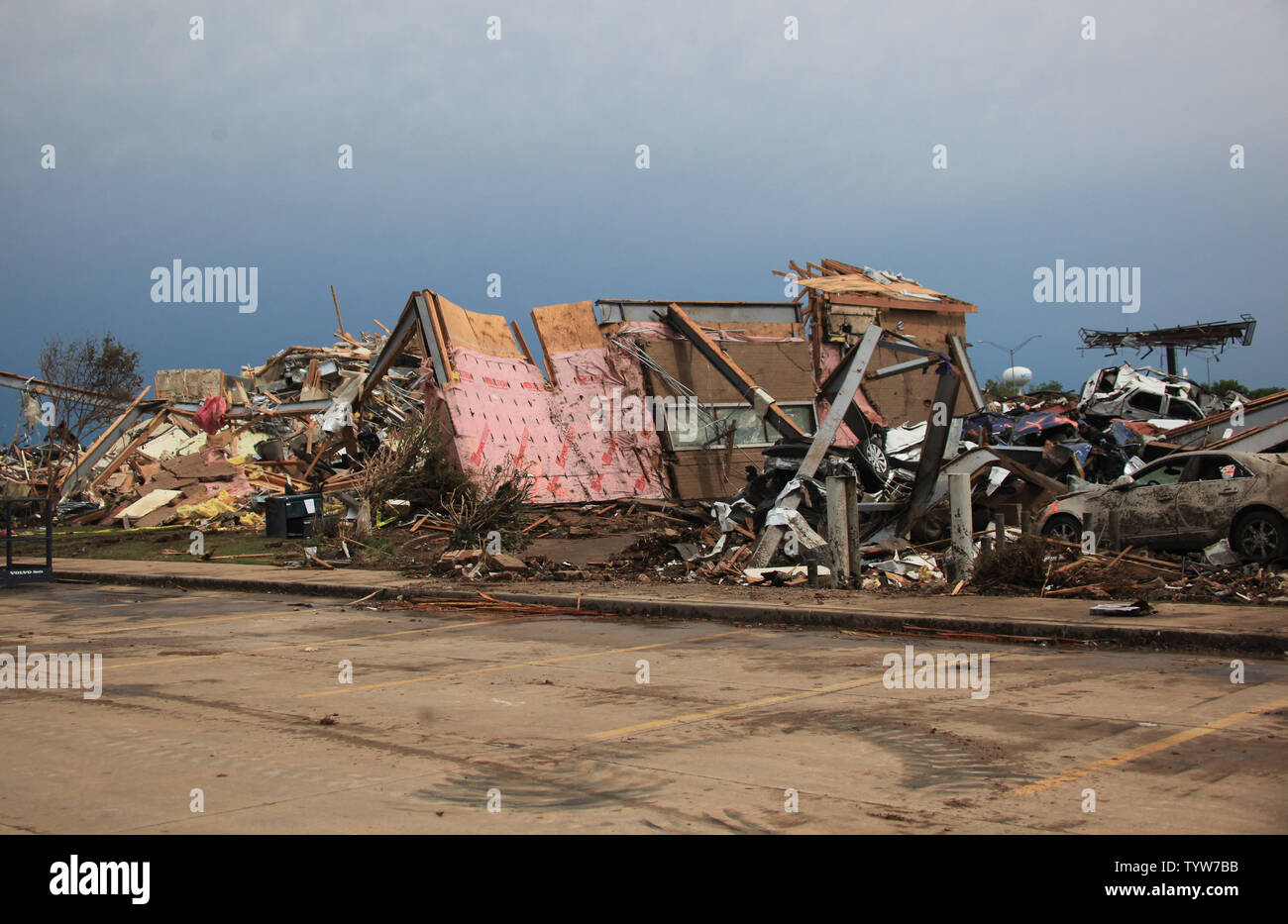 A path of destruction is seen in the aftermath of a series of tornadoes ...