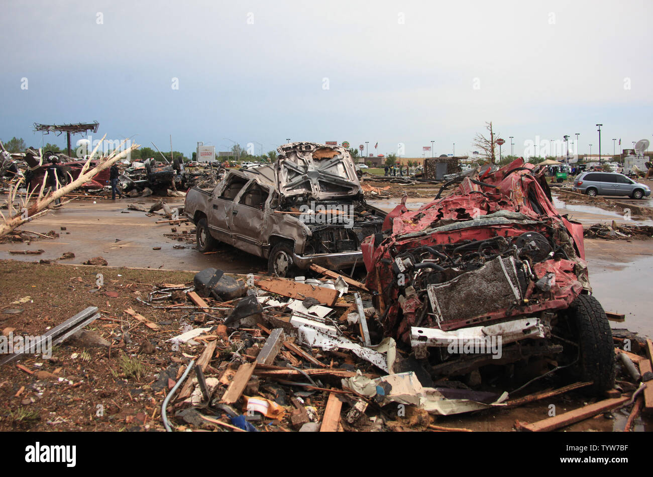 A path of destruction is seen in the aftermath of a series of tornadoes ...