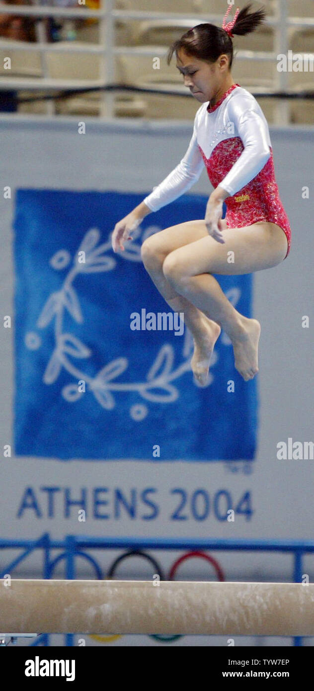 Japanese gymnast Kyoko Oshima practices her balance beam routine at Athens Olympic Indoor Hall