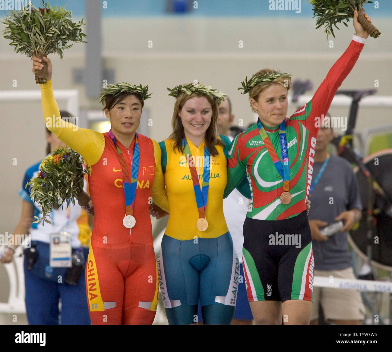 L. to R. Yonghua Jiang of China (silver), Anna Meares of Australia ...