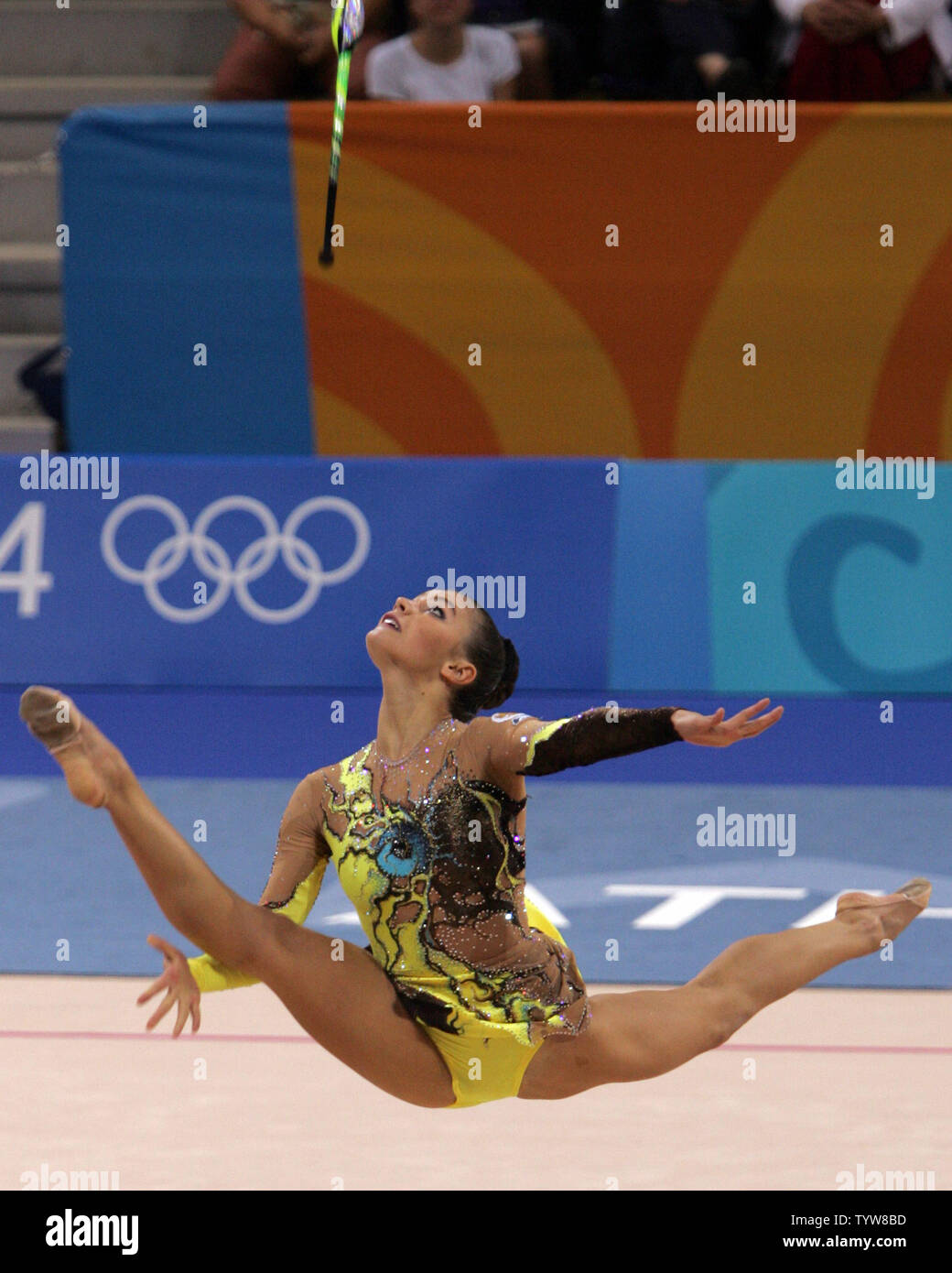 Russia's Alina Kabaeva performs her clubs routine in the rhythmic gymnastics individual all around final at the Athens Galatsi Hall in Athens on August 29, 2004. Kabaeva finished the four-apparatus event with a total of 108.400 points to win the gold medal.  (UPI Photo/Grace Chiu) Stock Photo