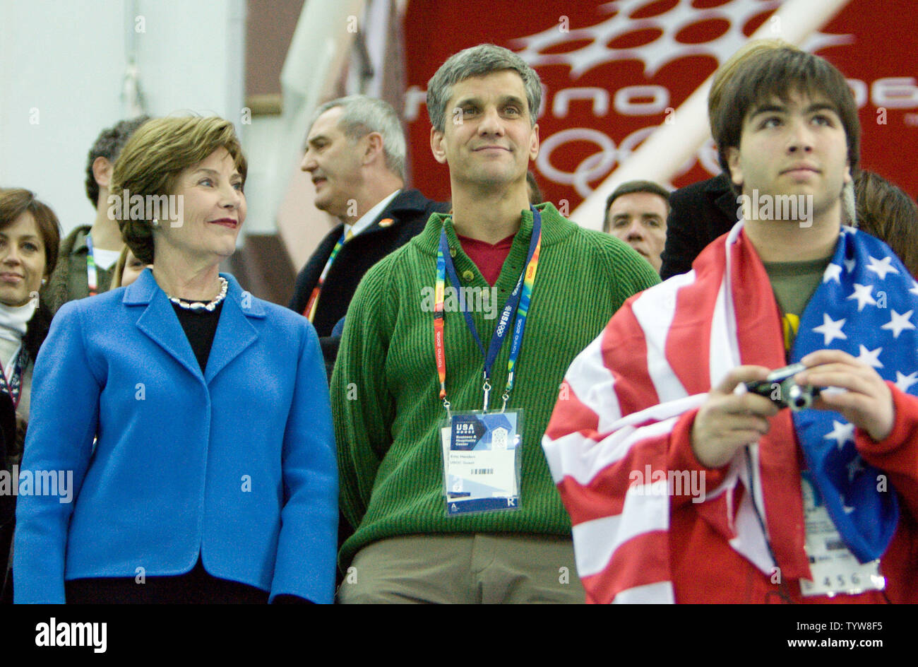 Laura Bush the wife of the President of the USA with Eric Heiden (R) attends men's 5000m speed skating at Oval Lingotto in the 2006 Torino Winter Olympic Games, February 11, 2006, where Chad Hendrick of the USA wins gold.  (UPI Photo/Heinz Ruckemann) Stock Photo