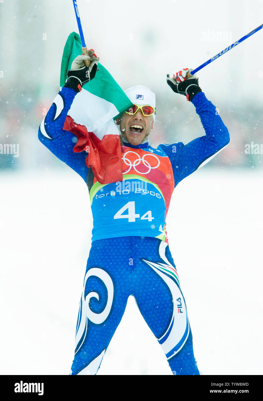 Italy's Cristian Zorzi crosses the finish anchoring his team to a gold ...