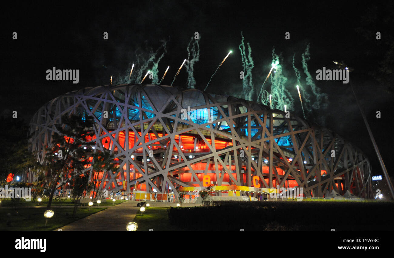 Fireworks explode over the National Stadium, called the Bird's Nest, during the dress rehearsal for the 2008 Olympics in Beijing on August 2, 2008. The official opening ceremony for the Summer Games is August 8, 2008.   (UPI Photo/Pat Benic) Stock Photo