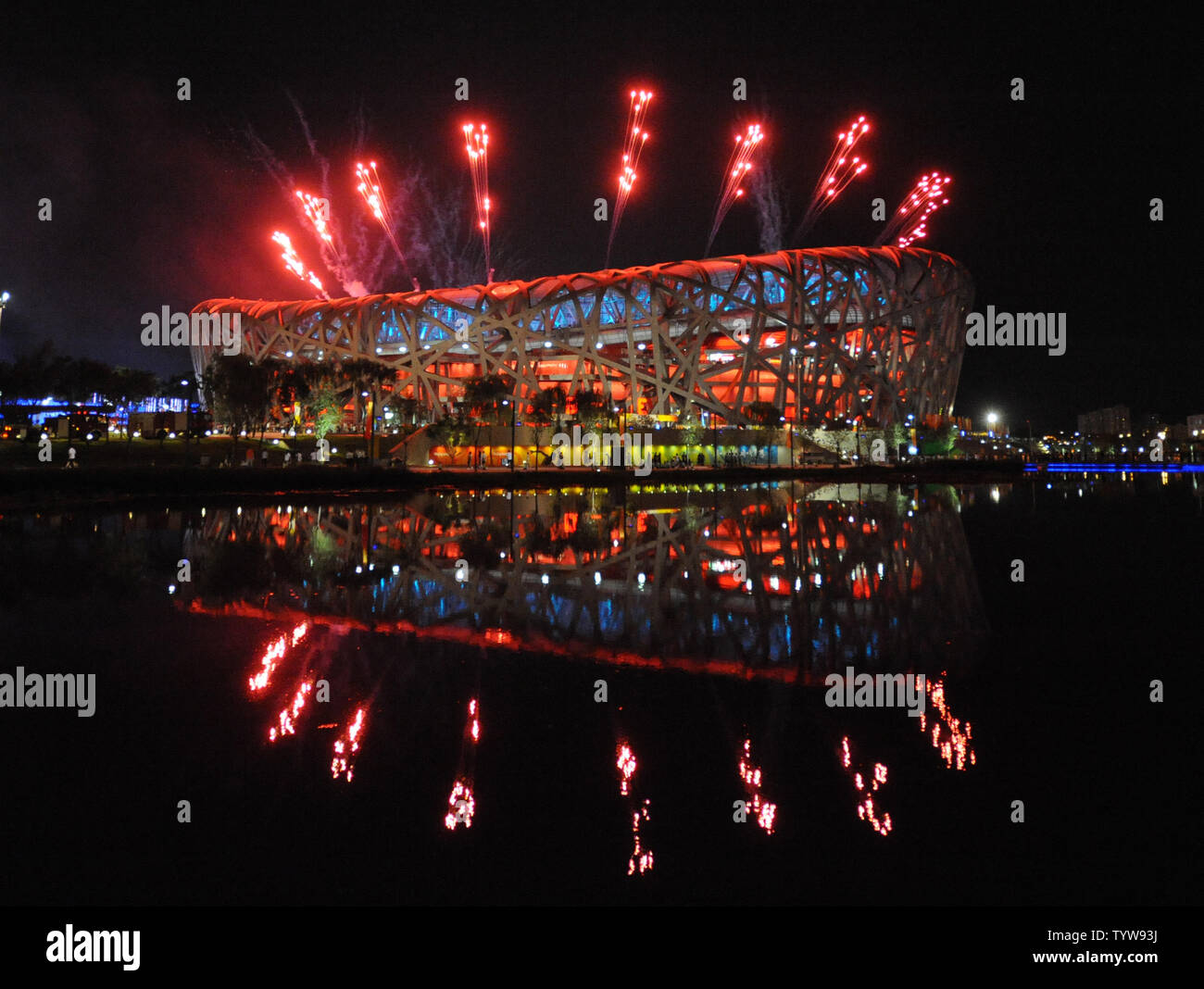 Fireworks explode over the National Stadium, called the Bird's Nest, during the dress rehearsal for the 2008 Olympics in Beijing on August 2, 2008.  The official opening ceremony for the Summer Games is August 8, 2008.   (UPI Photo/Pat Benic) Stock Photo