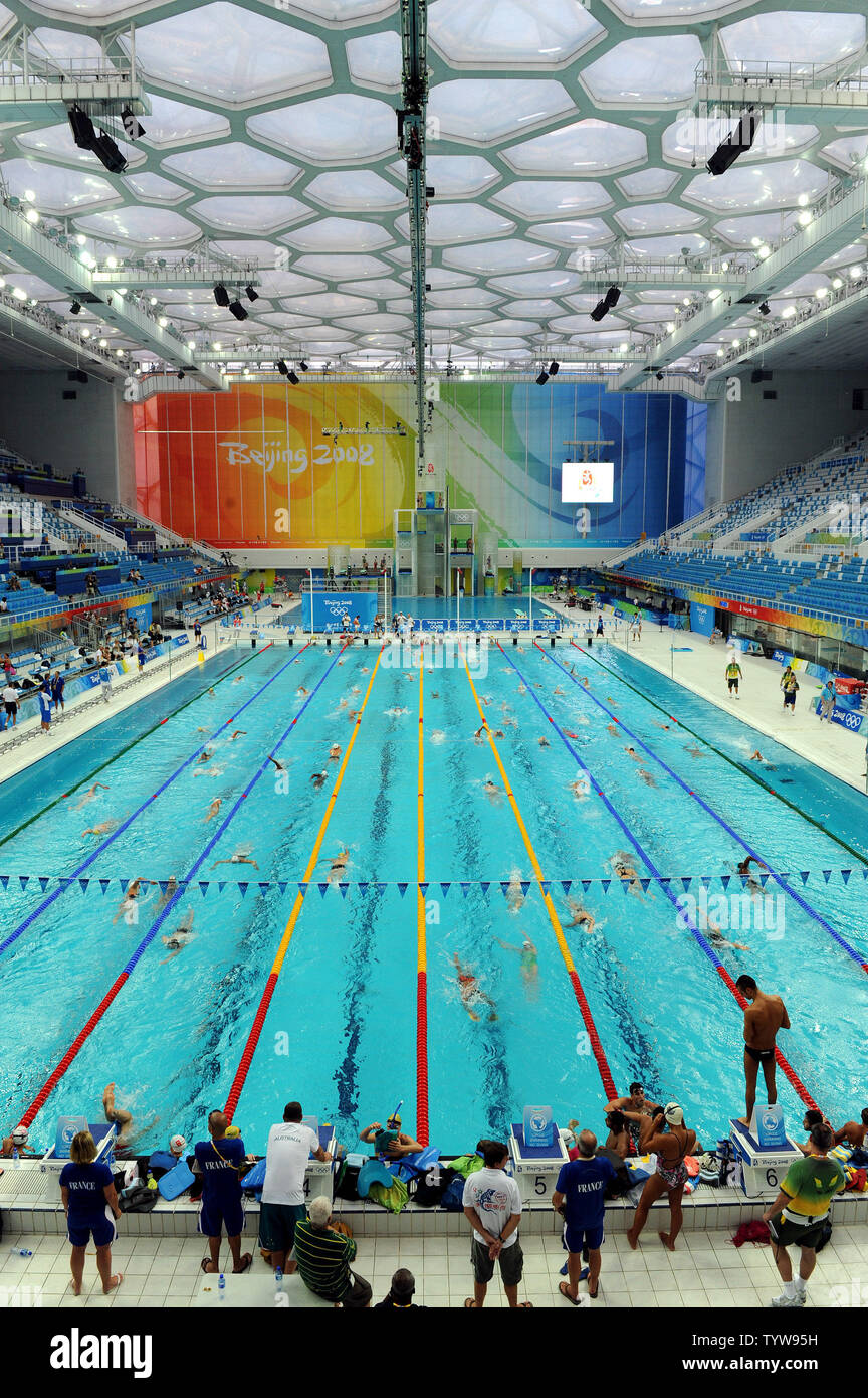 Swimmers practice at the National Aquatic Center, known as the Water Cube, in Beijing, China, on August 5, 2008. The 2008 Summer Olympics Opening Ceremony will be on August 8.      (UPI Photo/Roger L. Wollenberg) Stock Photo