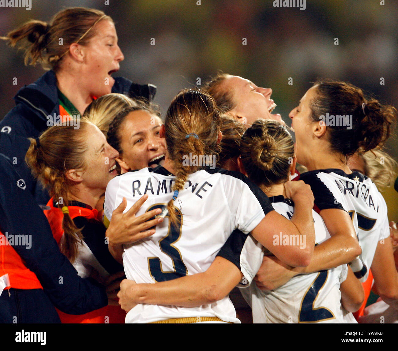 USA's team celebrate after defeating Brazil in the women's football final to take home the gold at the Beijing 2008 Olympic Games August 21, 2008.  (UPI Photo/Stephen Shaver) Stock Photo