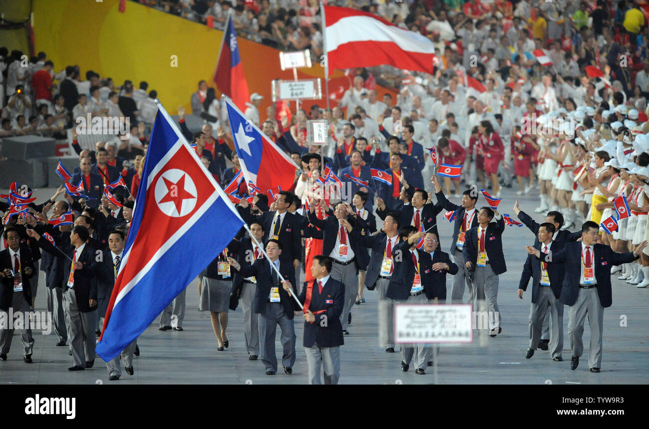 The North Korean Olympic Team marches into National Stadium, also