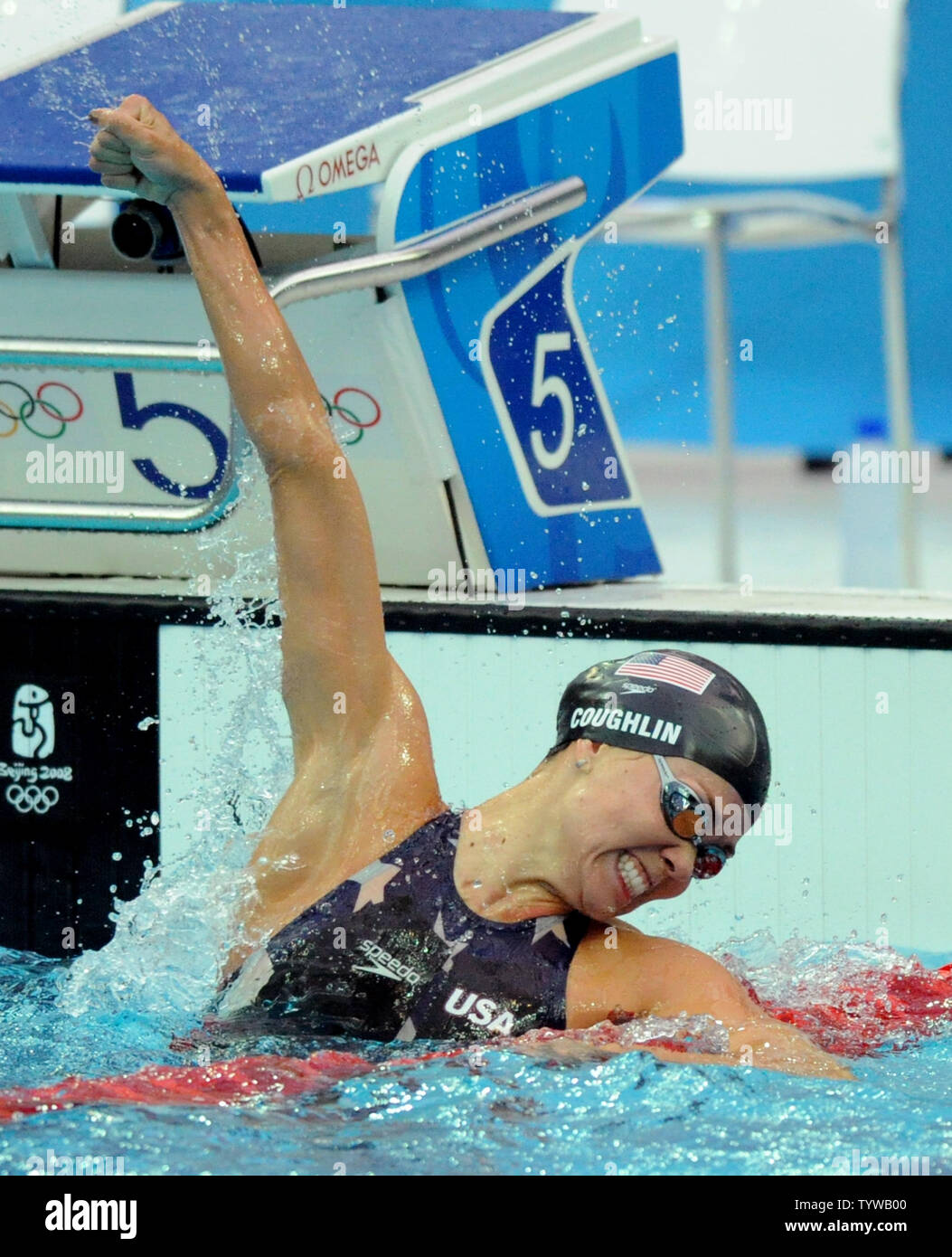 USA's Natalie Coughlin waves her arms in jubilation after she wins the gold in the Women's 100M Backstroke at the National Aquatics Center at the Summer Olympics in Beijing on August 12, 2008.  Coughlin's time was 58.96.   (UPI Photo/Pat Benic) Stock Photo