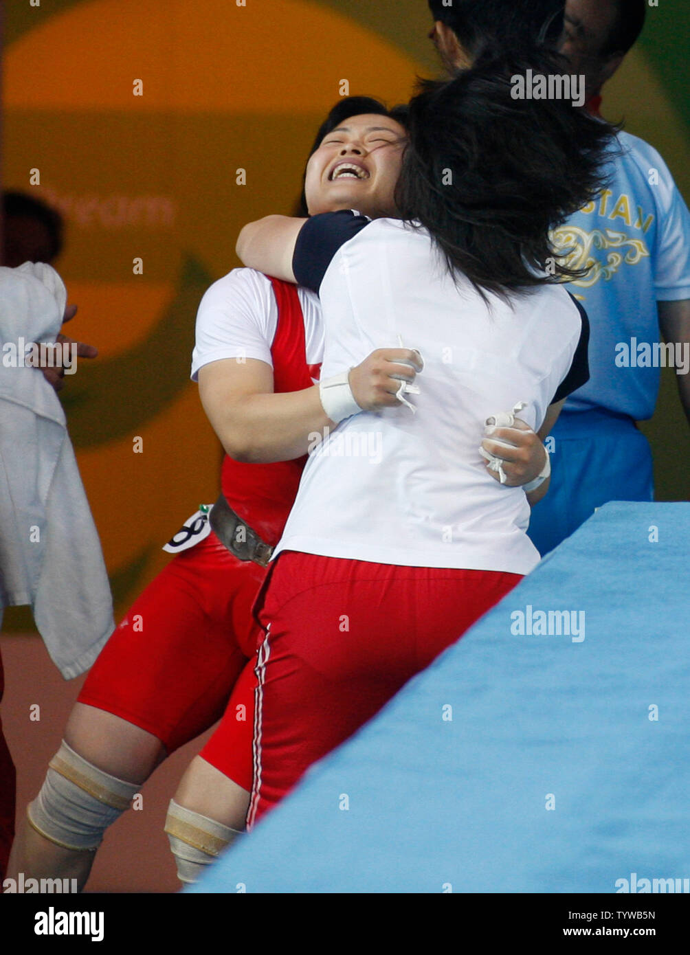 Hyon Suk Pak of DPR Korea celebrates after winning the gold medal in the  Women's 63 KG class at the 2008 Summer Olympics in Beijing on August 12, 2008.  (UPI Photo/Terry Schmitt) Stock Photo