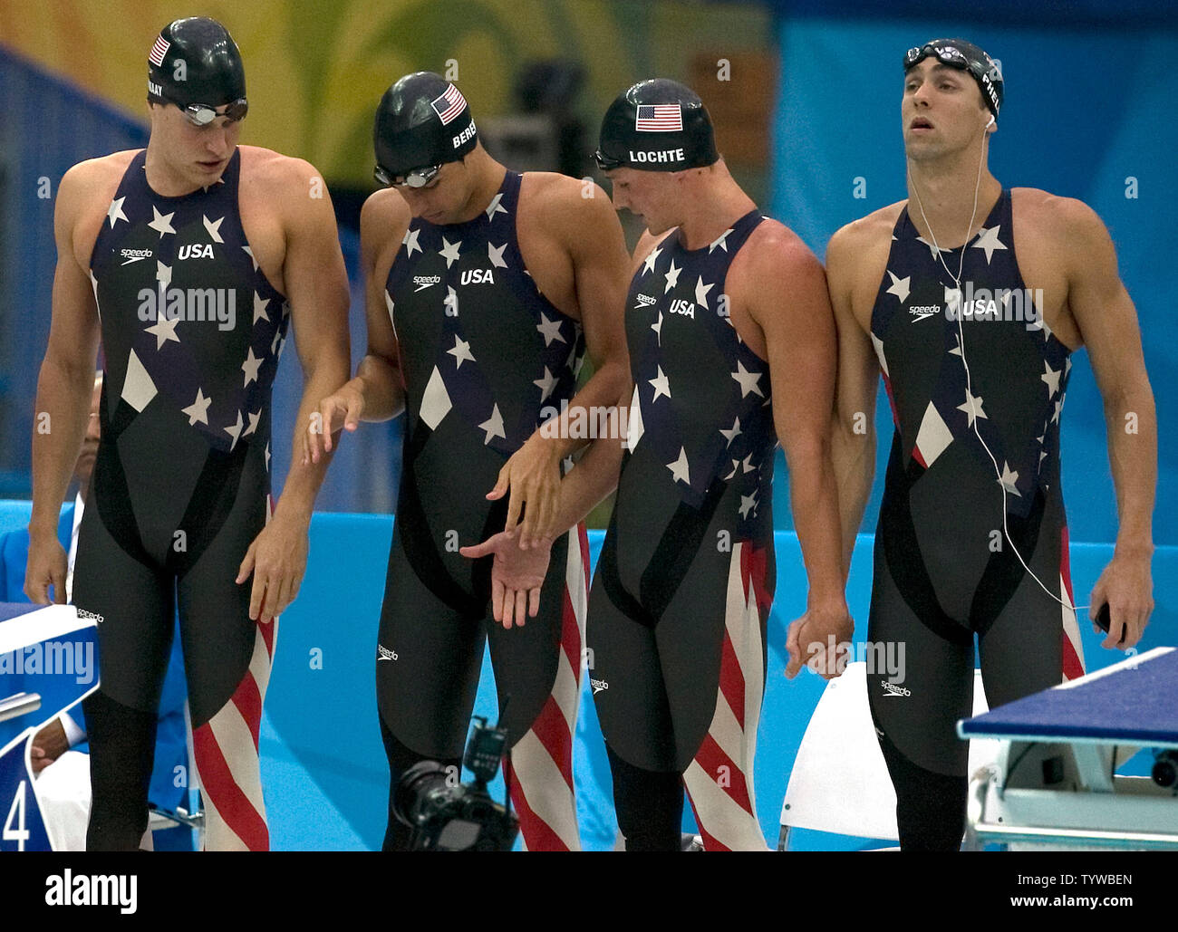 R-L) USA swimmers Michael Phelps, Ryan Lochte, Ricky Berens and Peter  Vanderkaay hold hands before the start of the men's 4 x 200 meters freestyle  relay swimming final during the Beijing 2008