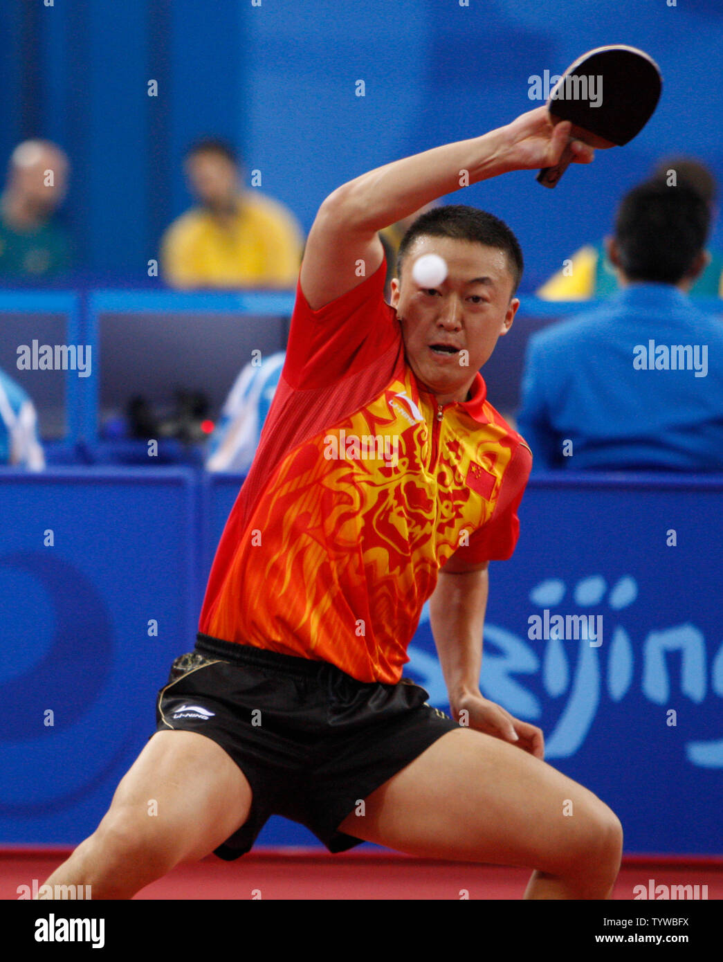 Ma Lin of China volleys with Panagiotis Gionis of Greece in the first round of Table Tennis eliminations in Beijing on August 13, 2008. Lin defeated Gionis.  (UPI Photo/Terry Schmitt) Stock Photo