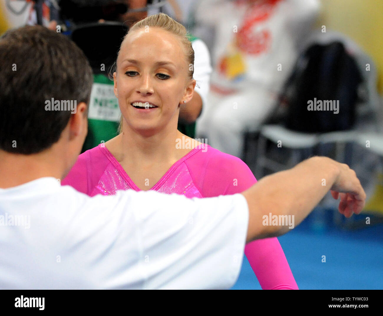 USA's Nastia Liukin is hugged by her father and coach Valerie after her