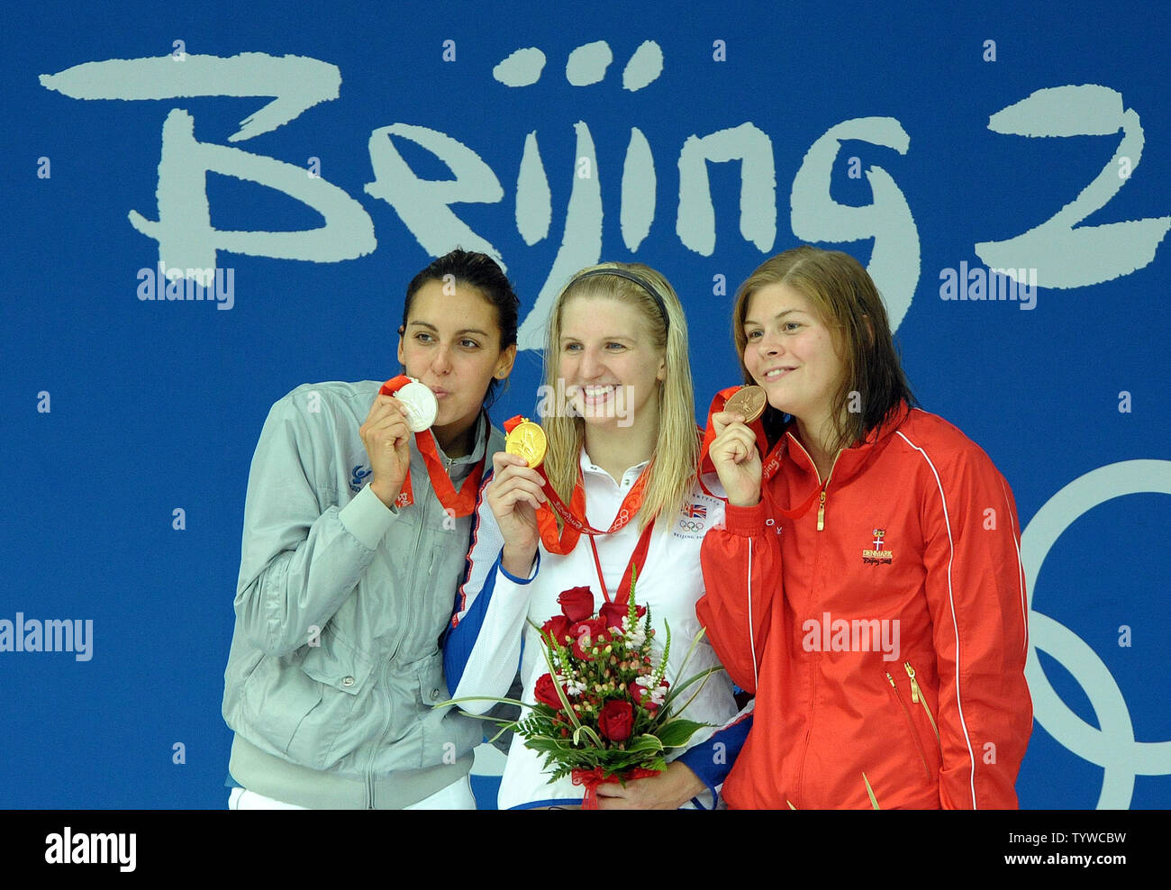Alessia Filippi (silver), Britain's Rebecca Adlington (gold) and Denmarks Lotte Friis (bronze) show the medals they won in the Women's 800M Freestyle at the National Aquatic Center (Water Cube) during the 2008 Summer Olympics in Beijing, China, on August 16, 2008.     (UPI Photo/Roger L. Wollenberg) Stock Photo
