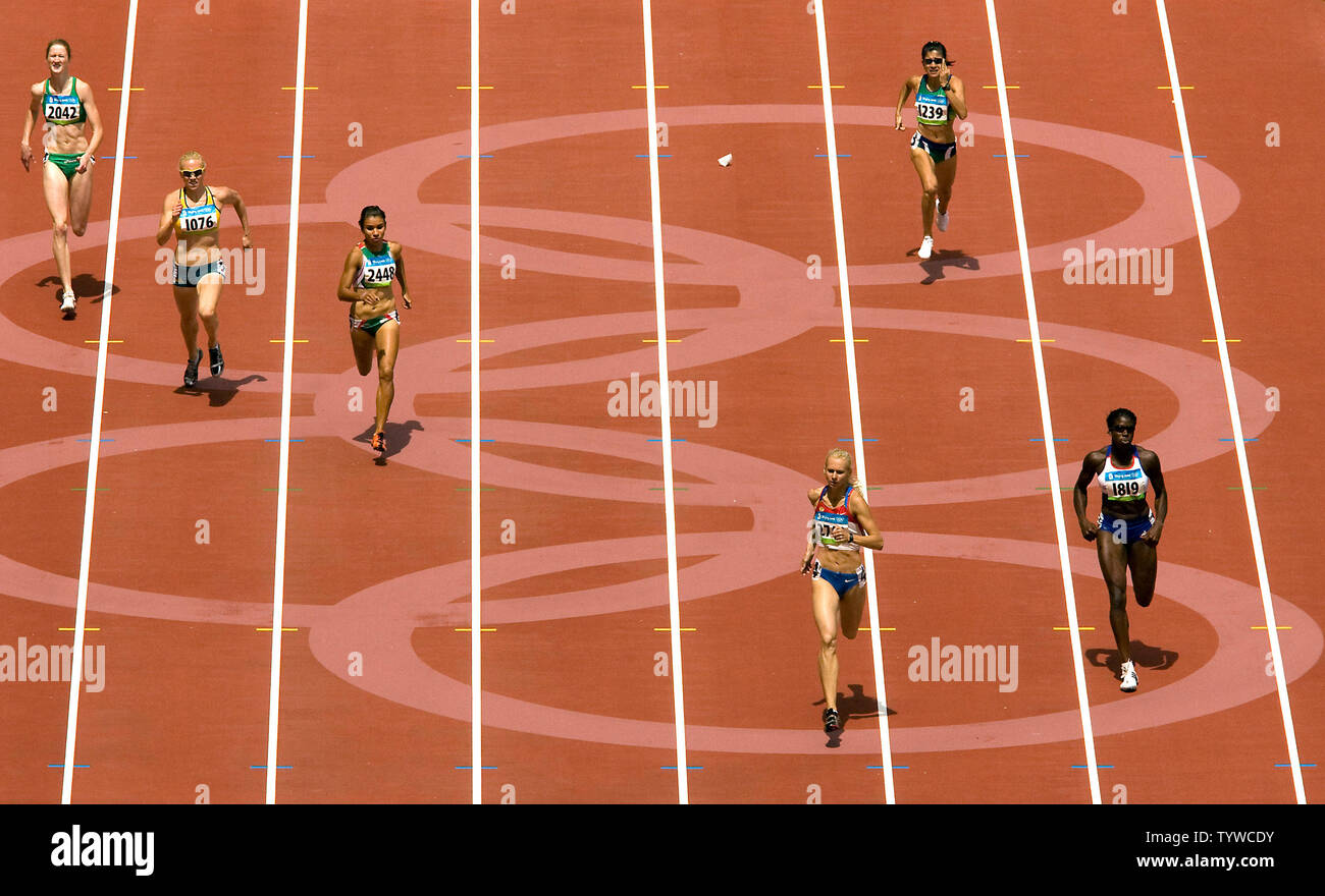 (R-L) Britain's Christine Ohuruogu, Brazil's Maria Laura Amirao, Russia's Yulia Gushchina, Mexico's gabriela Medina, Austria's Tamsyn Lewis and Ireland's Joanne Cuddihy sprint for the finish line in round one of the Olympic women's 400m heats in Beijing August 16, 2008. Ohuruogu won the heat with a time of 51.00.  (UPI Photo/Stephen Shaver) Stock Photo