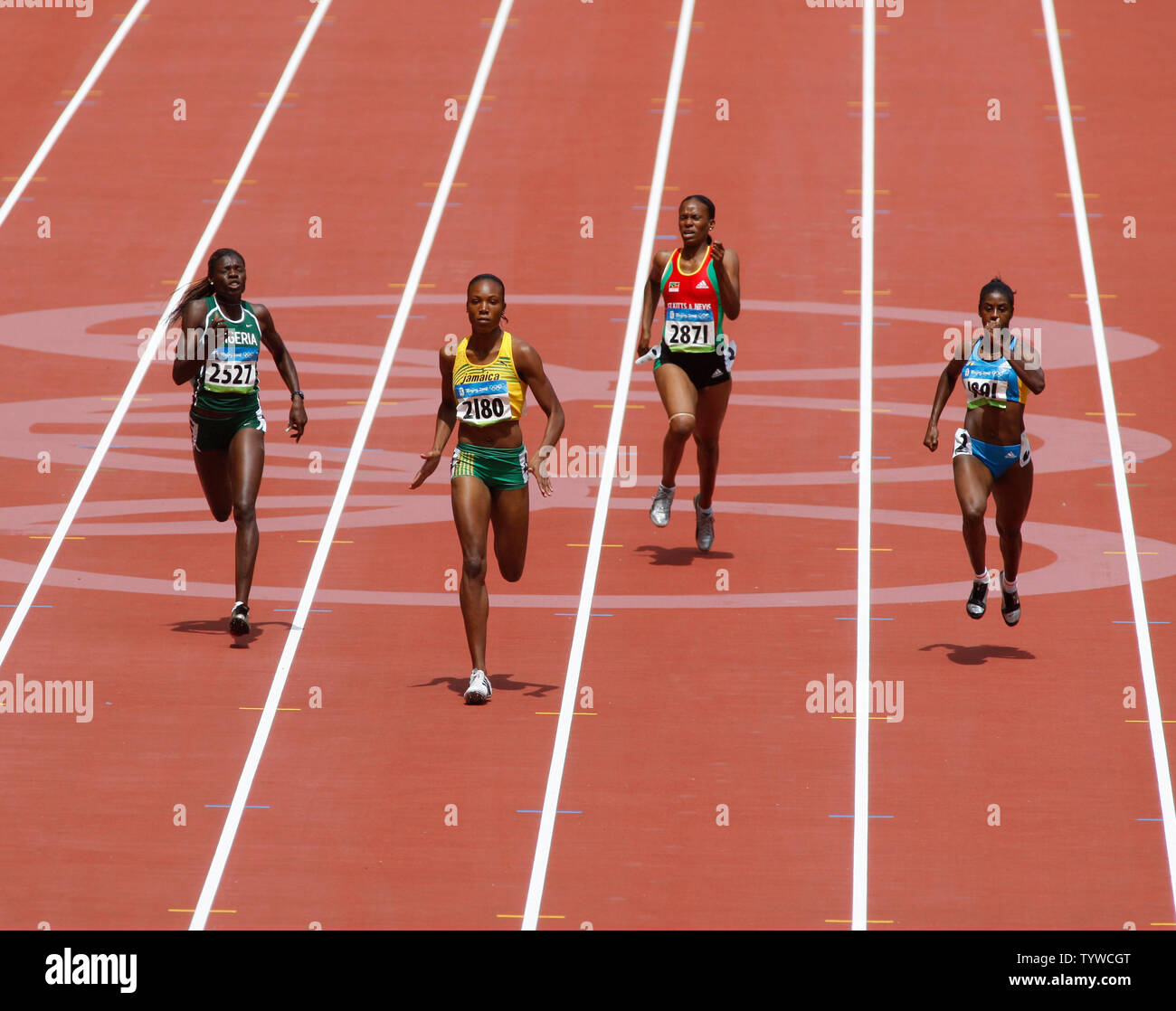 Ajoke Odumosu of Nigeria (2527), Rosemarie Whyte of Jamica (2180), Tiandra Ponteen of St. Kitts and Nevis (2871), and Cristine Amertil of the Bahamas compete on the Women's 400m at the 2008 Olympics in Beijing on August 16, 2008.    (UPI Photo/Terry Schmitt) Stock Photo