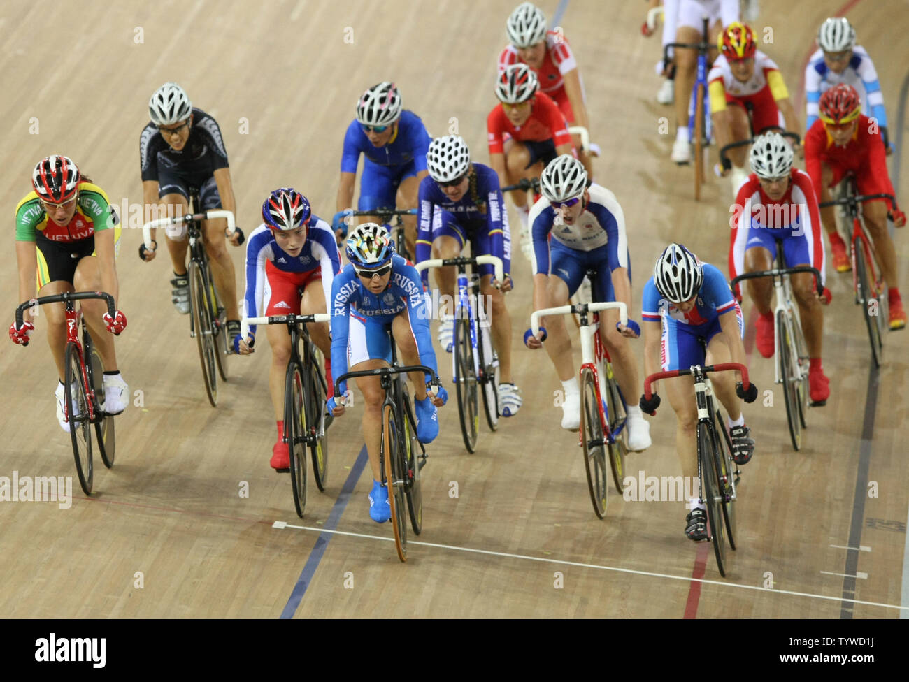 Cyclists sprint during the 100-lap Olympic women's point's race final at the Laoshan velodrome in Beijing August 18, 2008.  Dutch cyclist Marianne Vos captured the gold with 30 points, Cuba's Yoanka Gonzalez the silver with 18 points and  Spain's Leire Olaberria the bronze with 13 points.   (UPI Photo/Stephen Shaver) Stock Photo