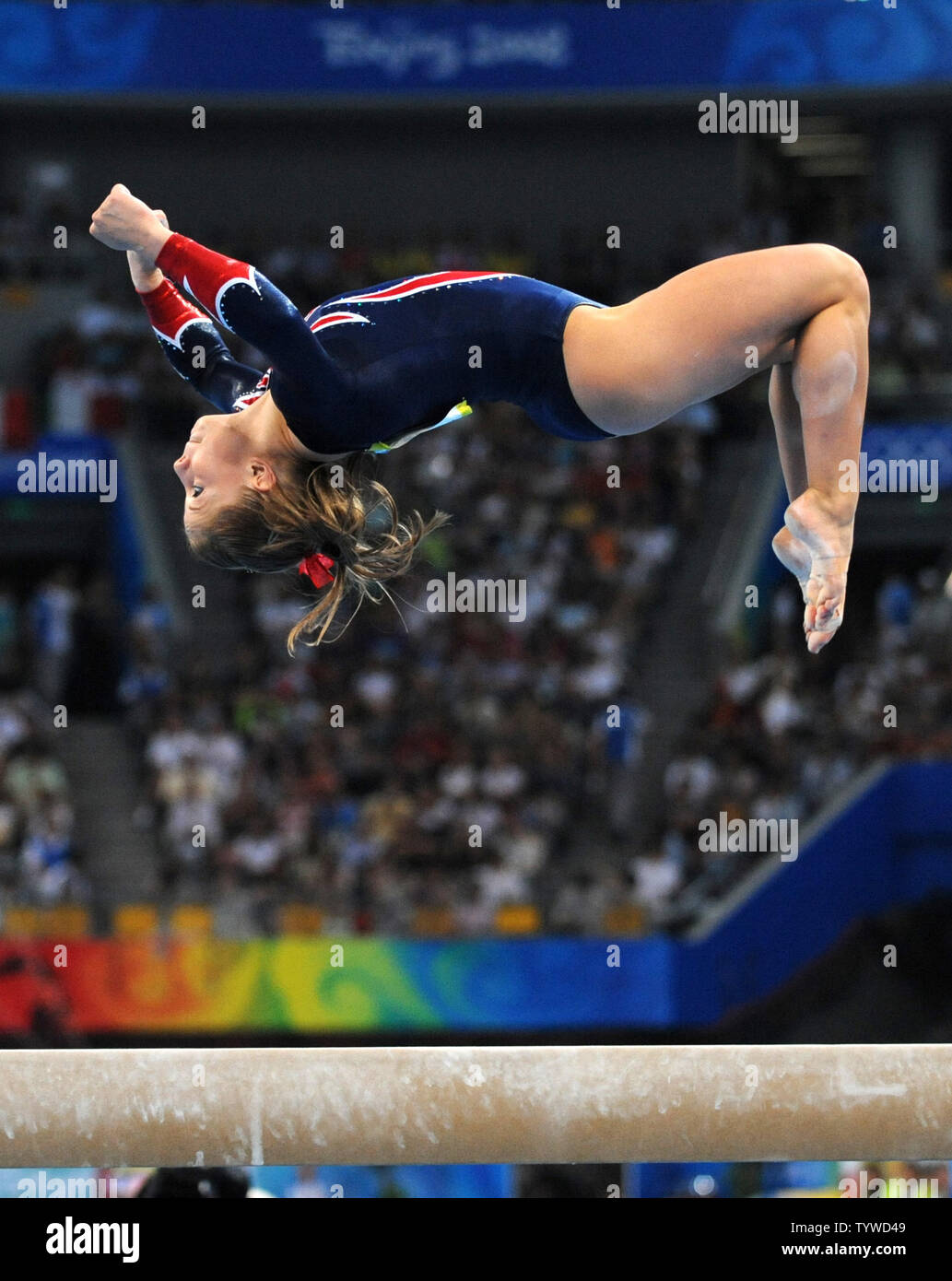 USA's Shawn Johnson flips on the beam during the Women's Beam Final in