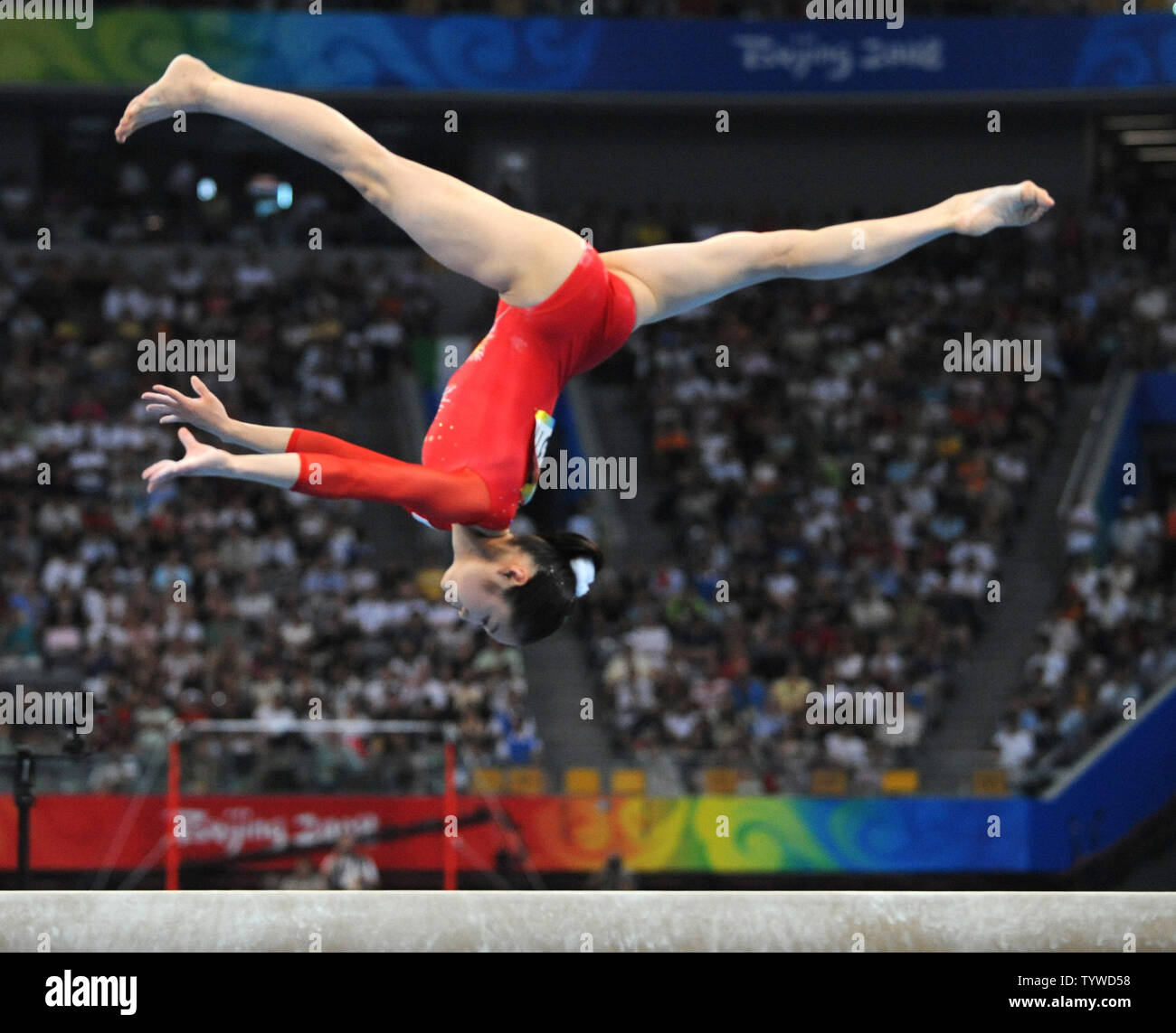 Japan's Koko Tsurumi leaps in her performance on the beam during the