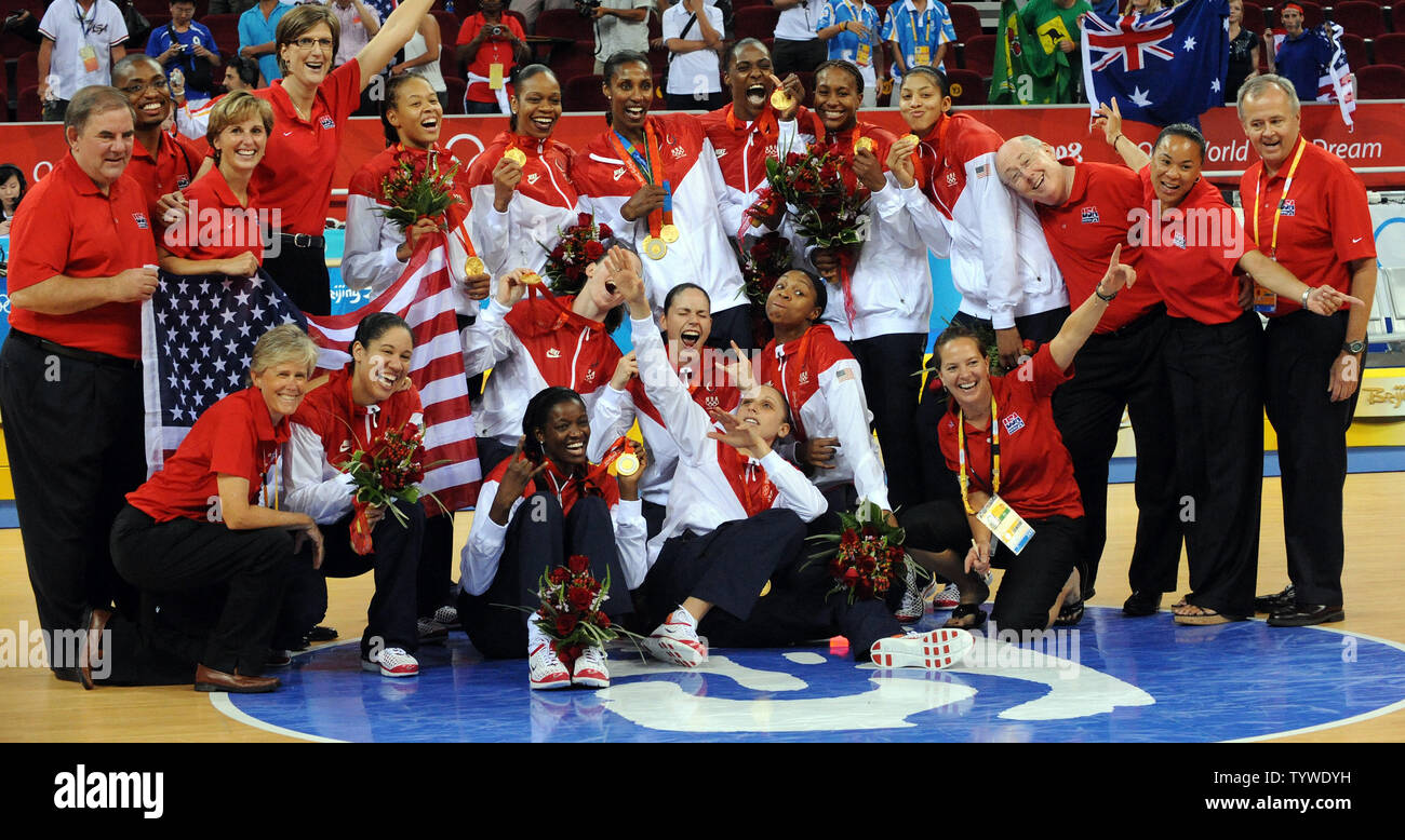 USA celebrates with their gold medals earned by defeating Australia in the  final Women's Basketball game during the 2008 Summer Olympics in Beijing on  August 23, 2008. USA defeated Australia 92-65 to
