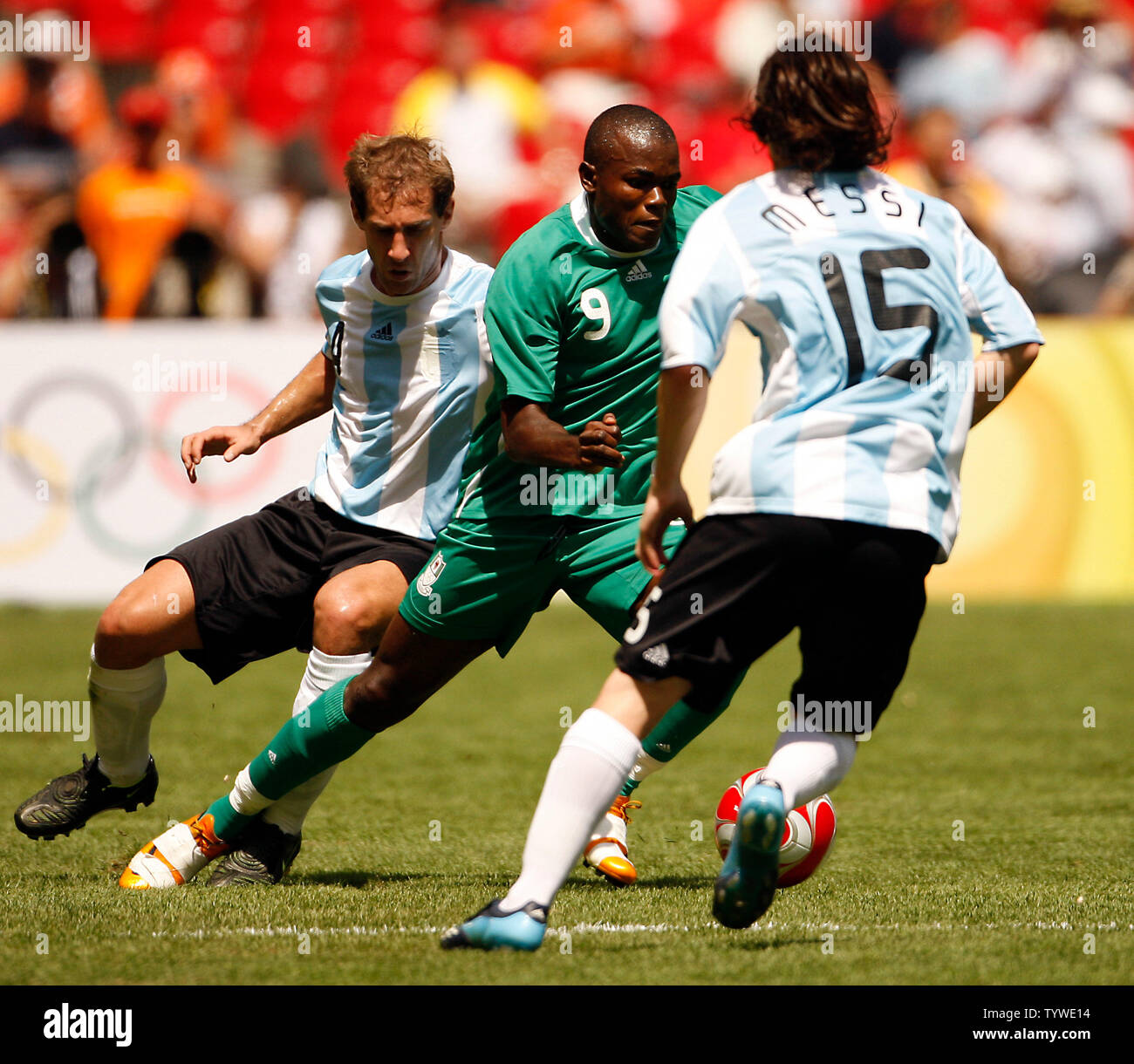 argentina-s-lionel-messi-r-and-teammate-juan-riquelme-converge-on-and