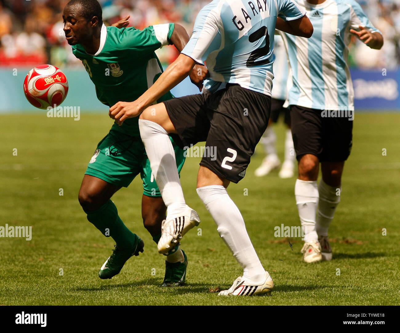 Argentina's Ezequiel Garay (R) and Nigeria's Promise Isaac fight for the ball during the men's football final in the Beijing 2008 Olympic Games August 23, 2008.  Argentina won 1-0 for the gold, while Nigeria settled for the silver and Brazil the bronze.  (UPI Photo/Stephen Shaver) Stock Photo