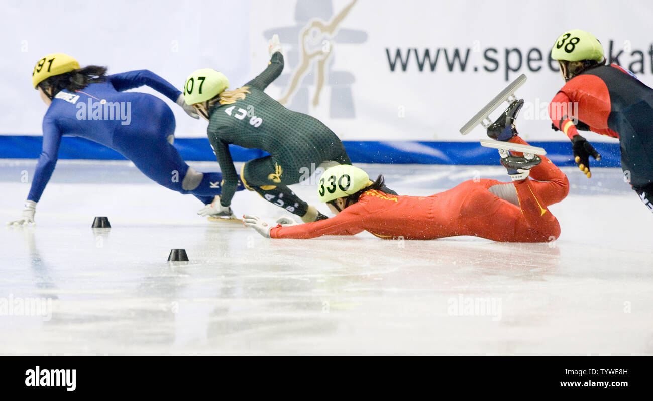 China's Nannan Zhao falls a second time after getting a restart the ...