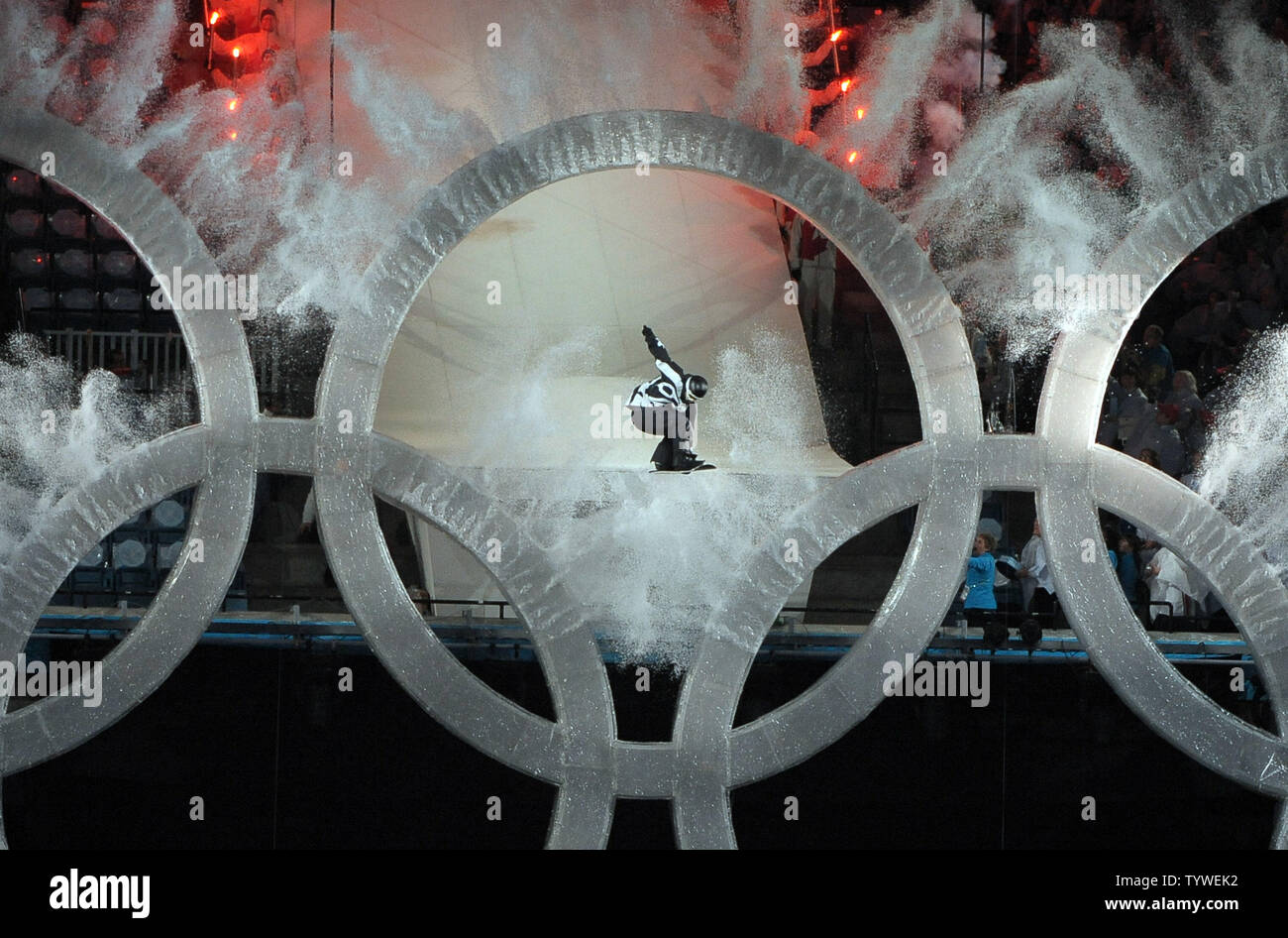 A snow boarder jumps through the Olympic Rings at the start of the Opening Ceremonies for the 2010 Winter Olympics at BC Place in Vancouver, Canada on February 12, 2010.     UPI/Roger L. Wollenberg Stock Photo