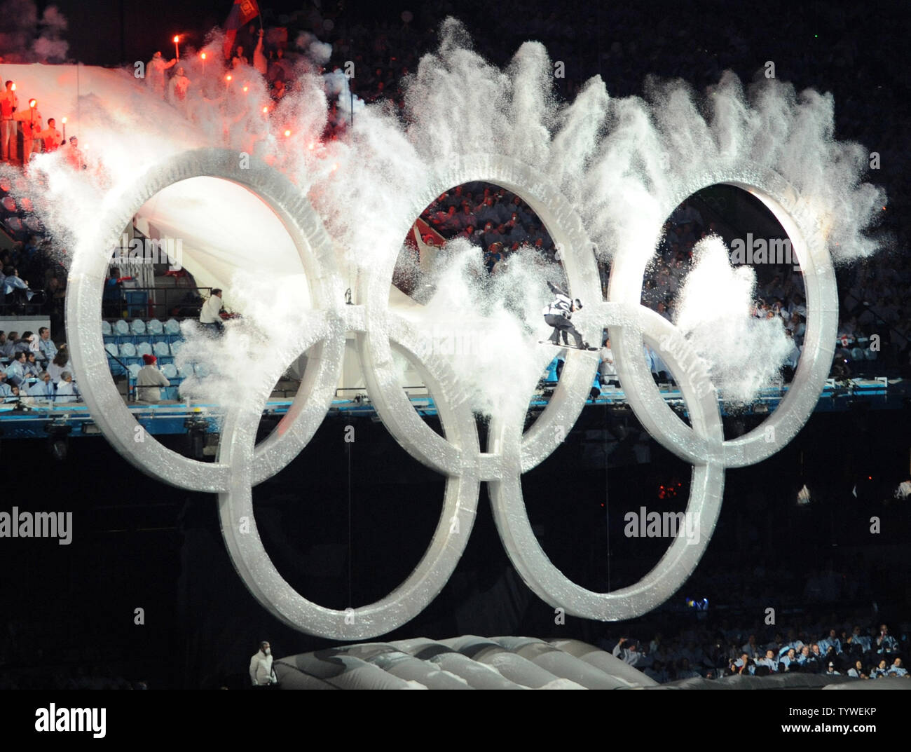 The Canadian snowboarder flys through the Olympic Rings during the opening ceremony for the 2010 Winter Olympics at BC Place in Vancouver, Canada on February 12, 2010.    UPI/Pat Benic Stock Photo
