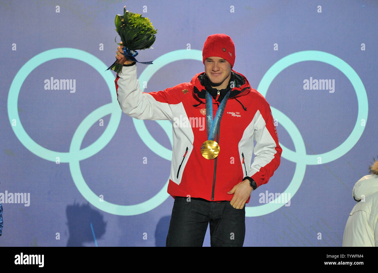 Gold medalist Switzerland's Dario Cologna celebrates during the victory ceremony for the Men's Cross-Country Skiing 15 km Free competition at the 2010 Vancouver Winter Olympics, at Whistler Creekside in Whistler, Canada, February 15, 2010.  UPI/Kevin Dietsch Stock Photo