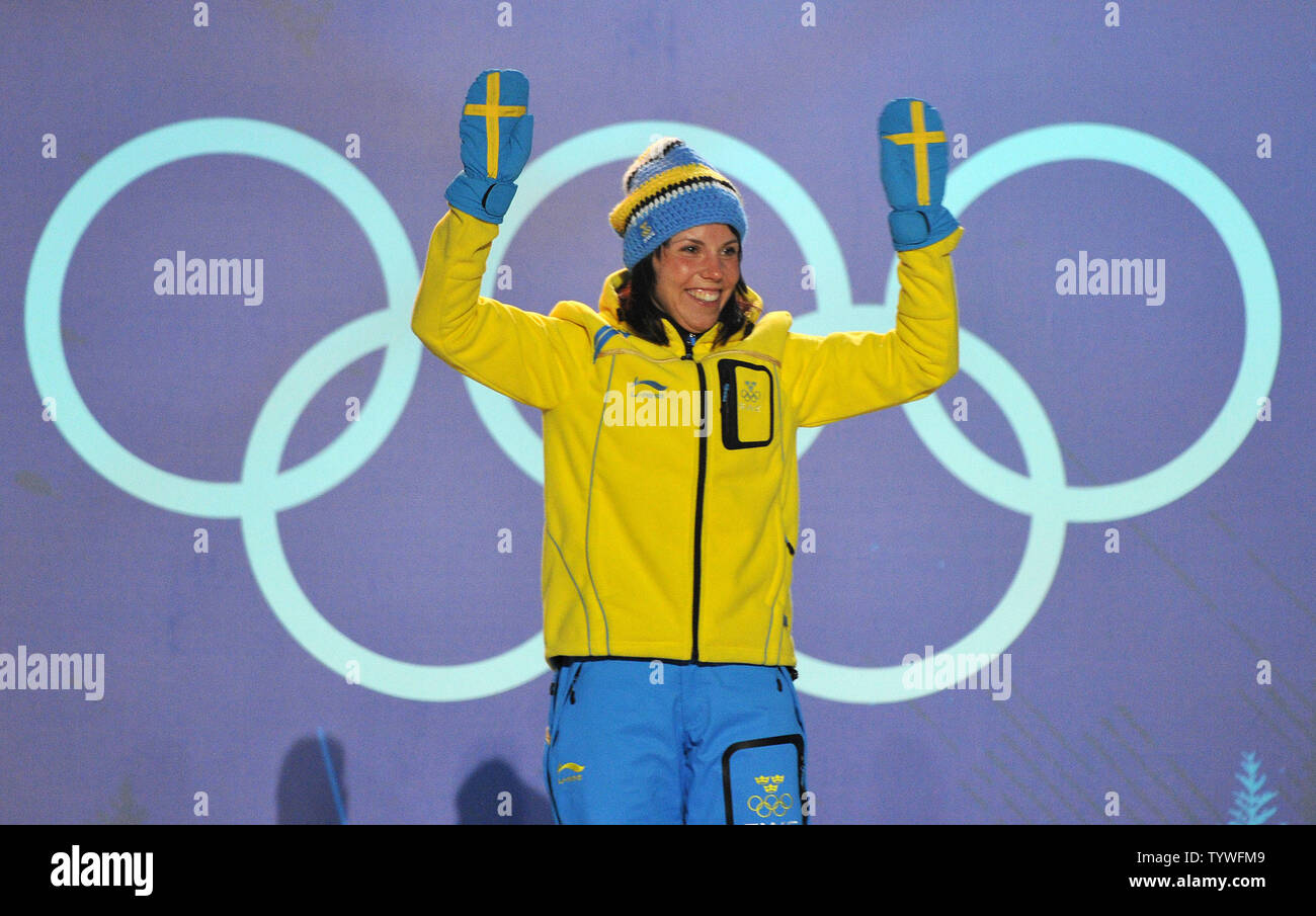 Gold medalist Sweden's Charlotte Kalla celebrates during the victory ceremony for the Women's Cross-Country Skiing 15 km Free competition at the 2010 Vancouver Winter Olympics, at Whistler Creekside in Whistler, Canada, February 15, 2010.  UPI/Kevin Dietsch Stock Photo