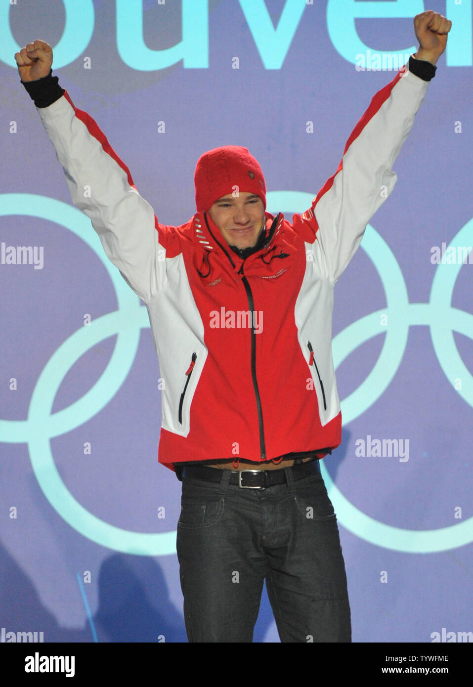 Gold medalist Switzerland's Dario Cologna celebrates during the victory ceremony for the Men's Cross-Country Skiing 15 km Free competition at the 2010 Vancouver Winter Olympics, at Whistler Creekside in Whistler, Canada, February 15, 2010.  UPI/Kevin Dietsch Stock Photo