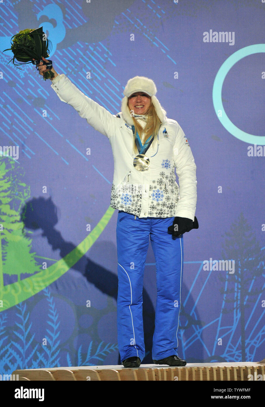 Silver medalist Estonia's Kristina Smigun-Vaehi celebrates during the victory ceremony for the Women's Cross-Country Skiing 15 km Free competition at the 2010 Vancouver Winter Olympics, at Whistler Creekside in Whistler, Canada, February 15, 2010.  UPI/Kevin Dietsch Stock Photo