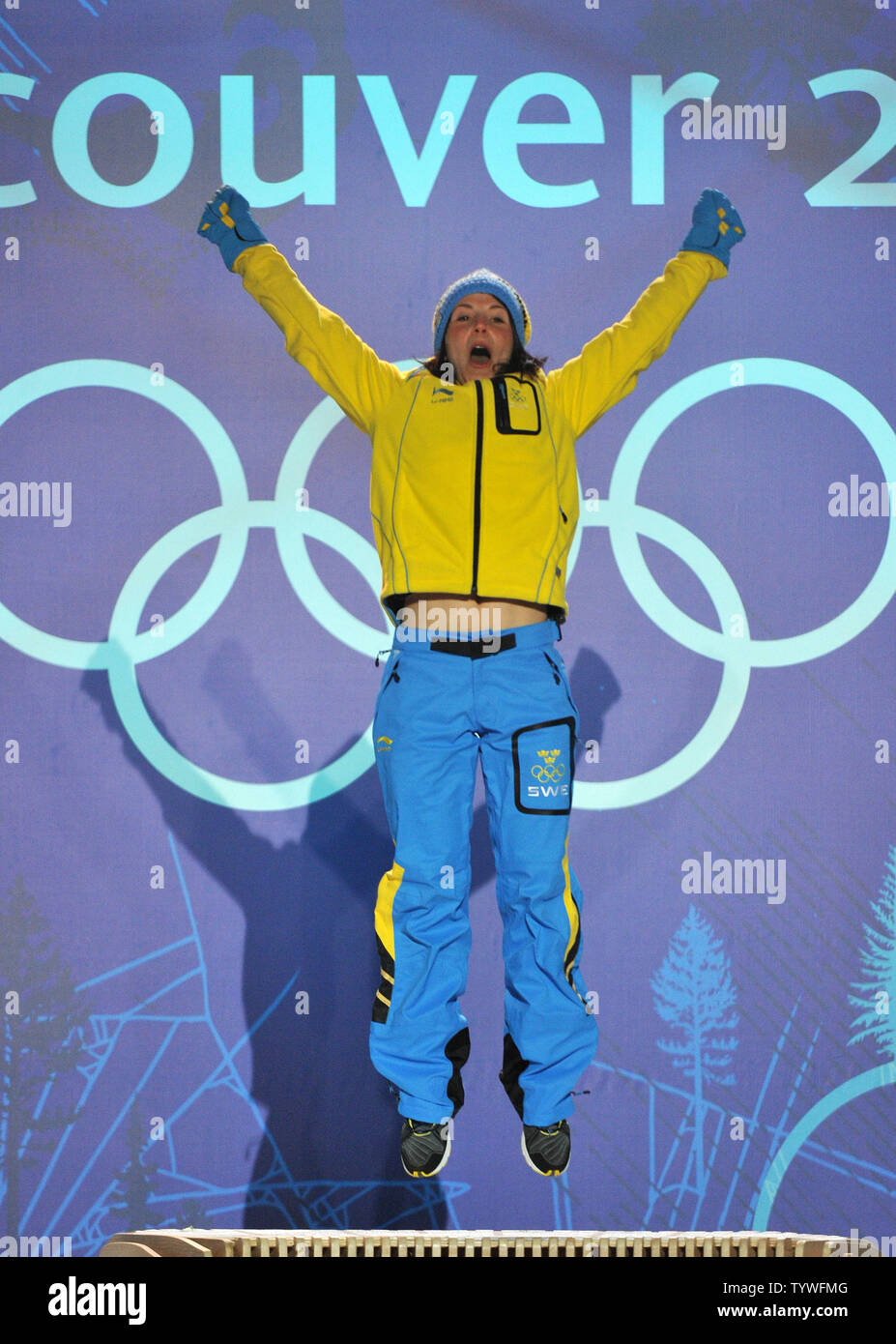 Gold medalist Sweden's Charlotte Kalla celebrates during the victory ceremony for the Women's Cross-Country Skiing 15 km Free competition at the 2010 Vancouver Winter Olympics, at Whistler Creekside in Whistler, Canada, February 15, 2010.  UPI/Kevin Dietsch Stock Photo