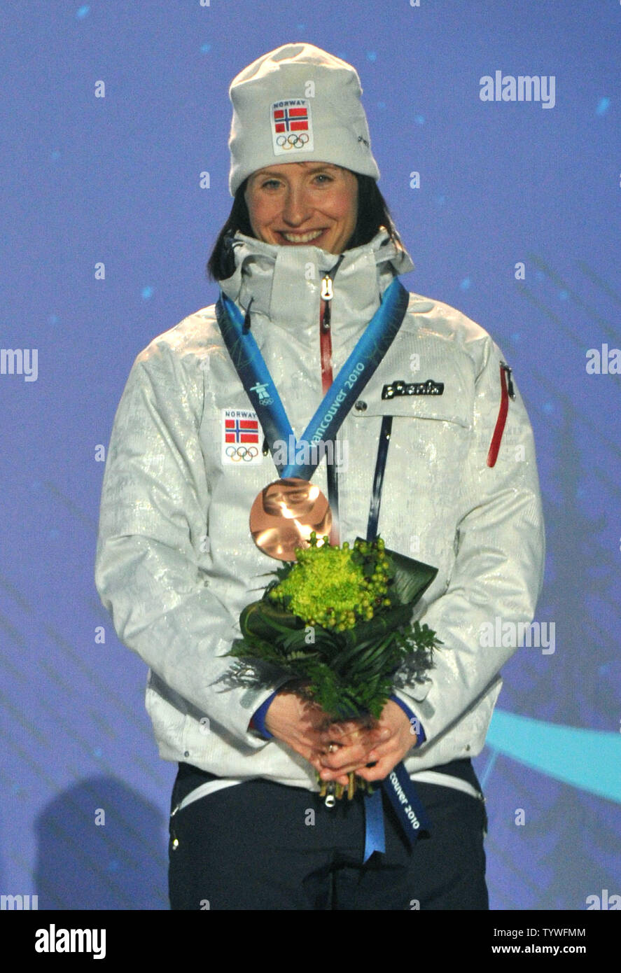 Bronze medalist Norway's Marit Bjoergen poses with her medal during the victory ceremony for the Women's Cross-Country Skiing 15 km Free competition at the 2010 Vancouver Winter Olympics, at Whistler Creekside in Whistler, Canada, February 15, 2010.  UPI/Kevin Dietsch Stock Photo
