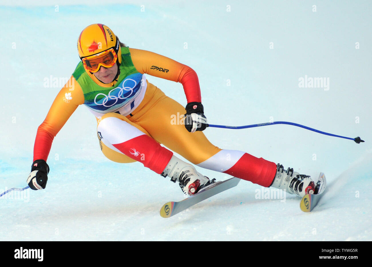 Canada's Emily Brydon speeds down the Women's Alpine Downhill course at ...