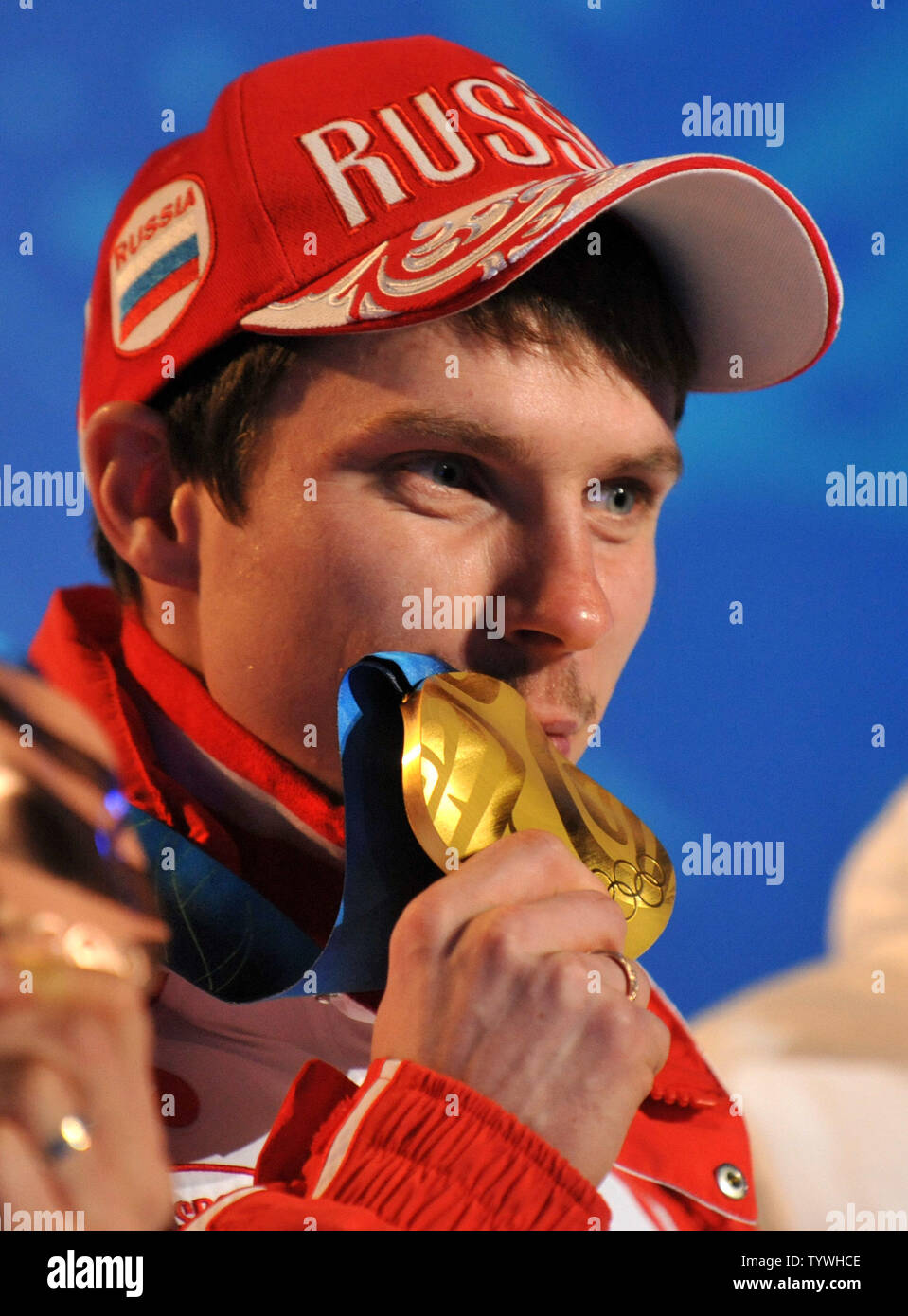 Gold medalist Russia's Evgeny Ustyugov poses with his medal during the victory ceremony for the Men's Biathlon 15 km Mass Start during the 2010 Vancouver Winter Olympics in Whistler, Canada on February 21, 2010. UPI/Kevin Dietsch Stock Photo