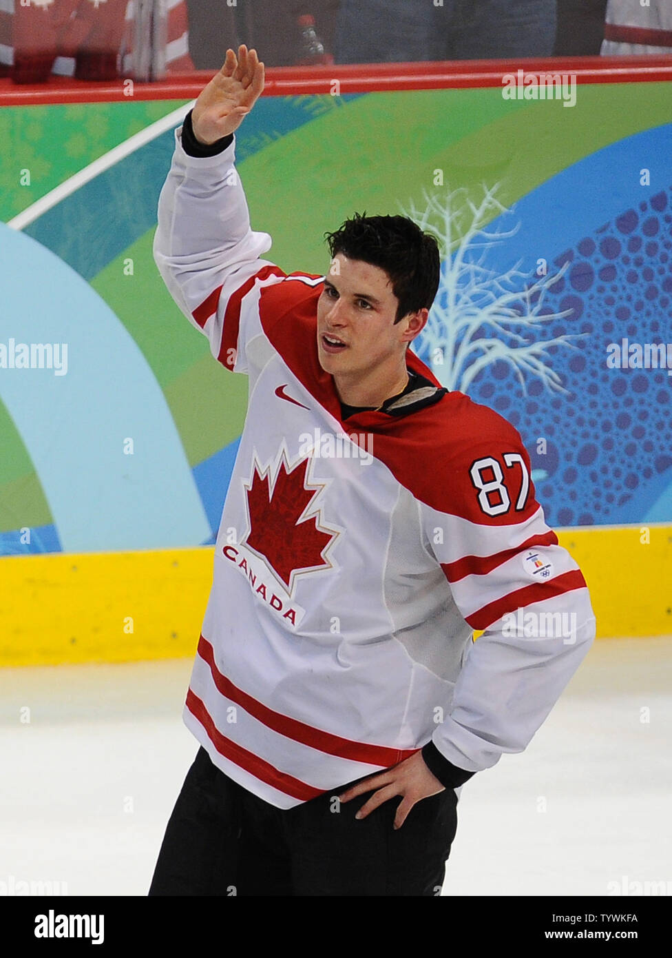 Canada's Sidney Crosby waves to cheering fans after scoring on USA's Ryan Miller to win in overtime of the gold medal men's ice hockey game at Canada Hockey Place in Vancouver, Canada, during the 2010 Winter Olympics on February 28, 2010.      UPI/Roger L. Wollenberg Stock Photo