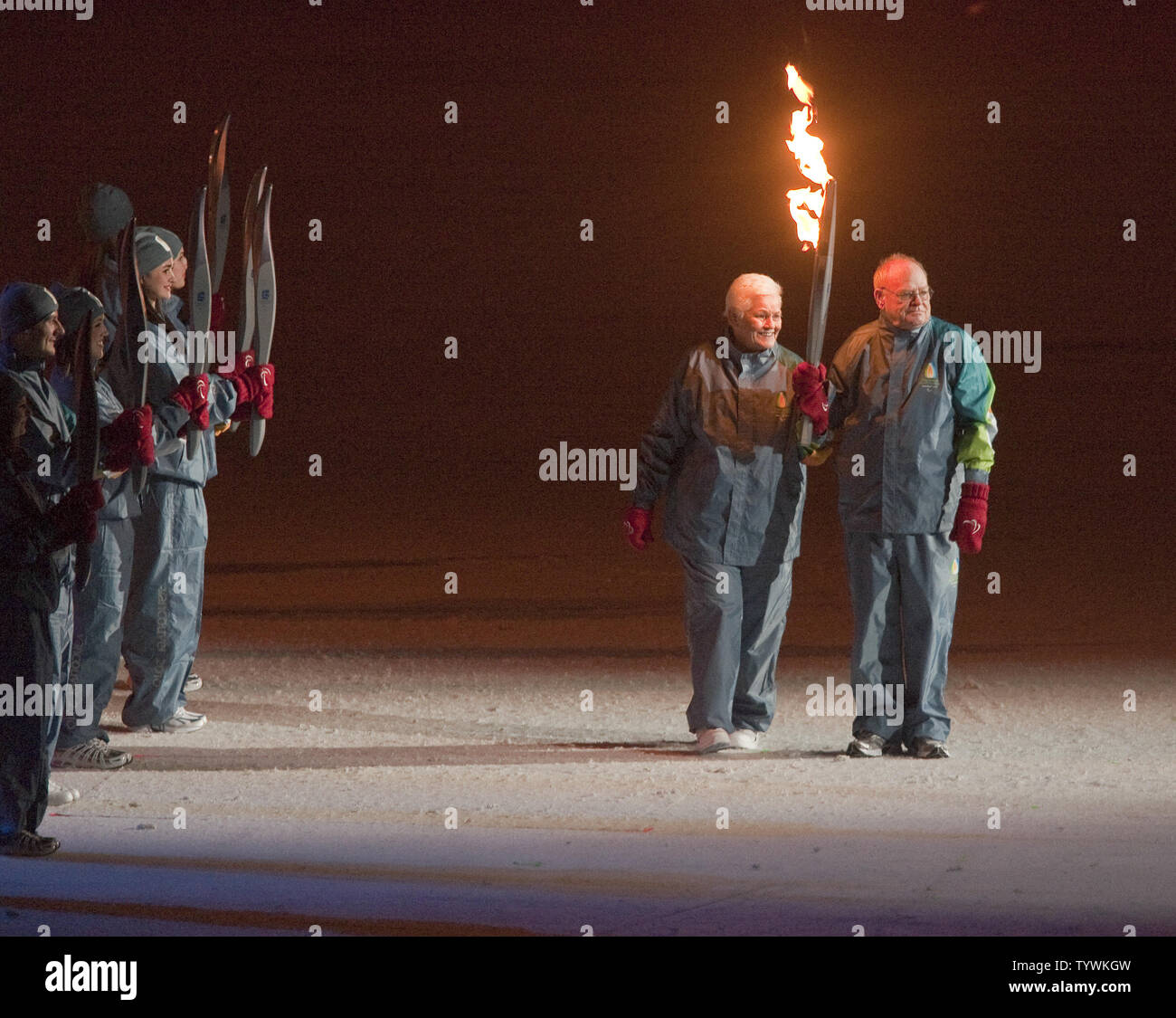 Betty and Rolly Fox the parents of Terry Fox carry the Paralympic torch into BC Place during the Vancouver 2010 Winter Paralympic Opening Ceremonies in Vancouver British Columbia (BC), March 12, 2010.   UPI/Heinz Ruckemann Stock Photo