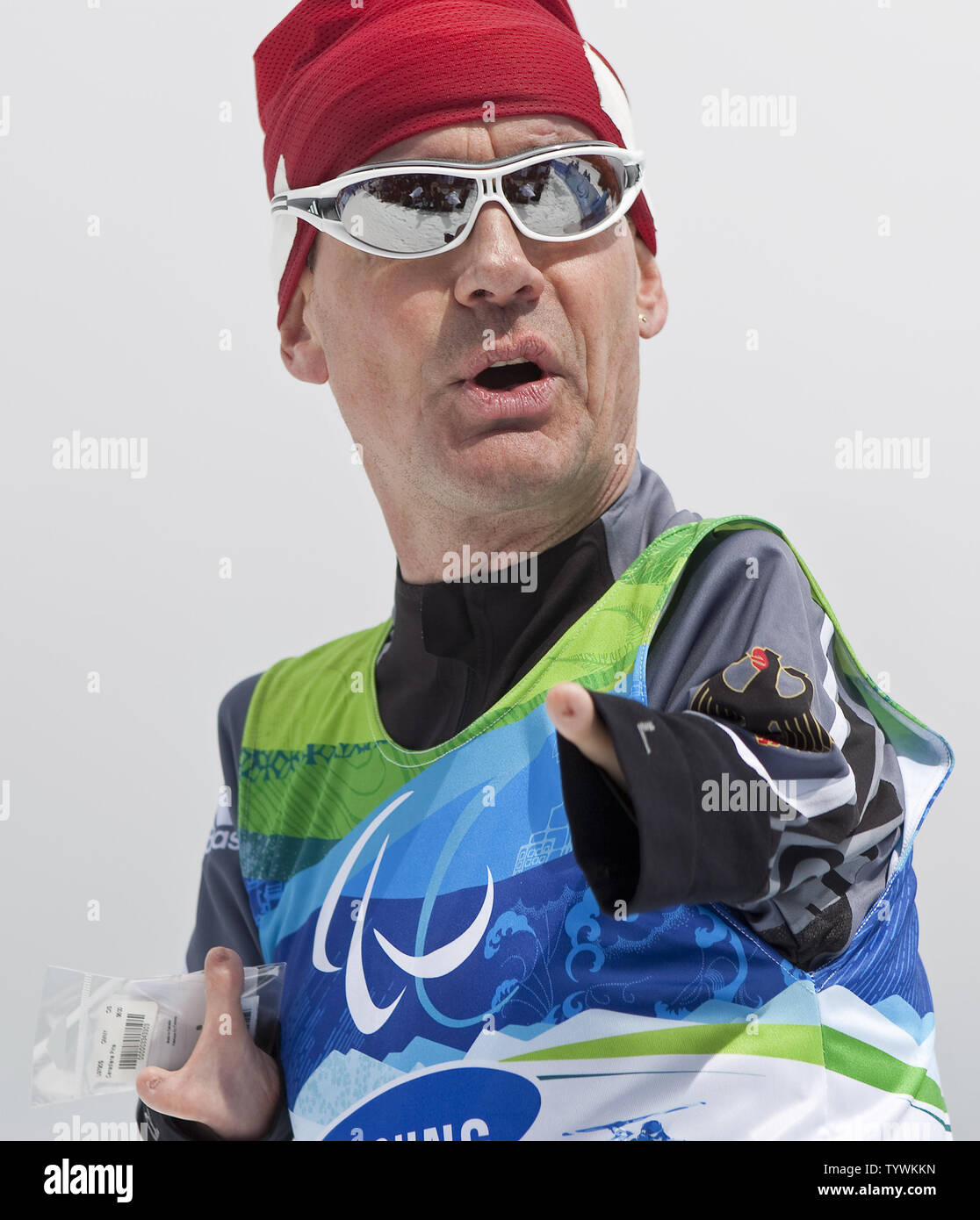 Germany's Josef Geisen celebrates winning bronze in Nordic Skiing Biathlon's men's 12.5 km, standing during the Vancouver 2010 Winter Paralympics at Whistler Paralympic Park, Whistler British Columbia, March 17, 2010.   UPI/Heinz Ruckemann Stock Photo