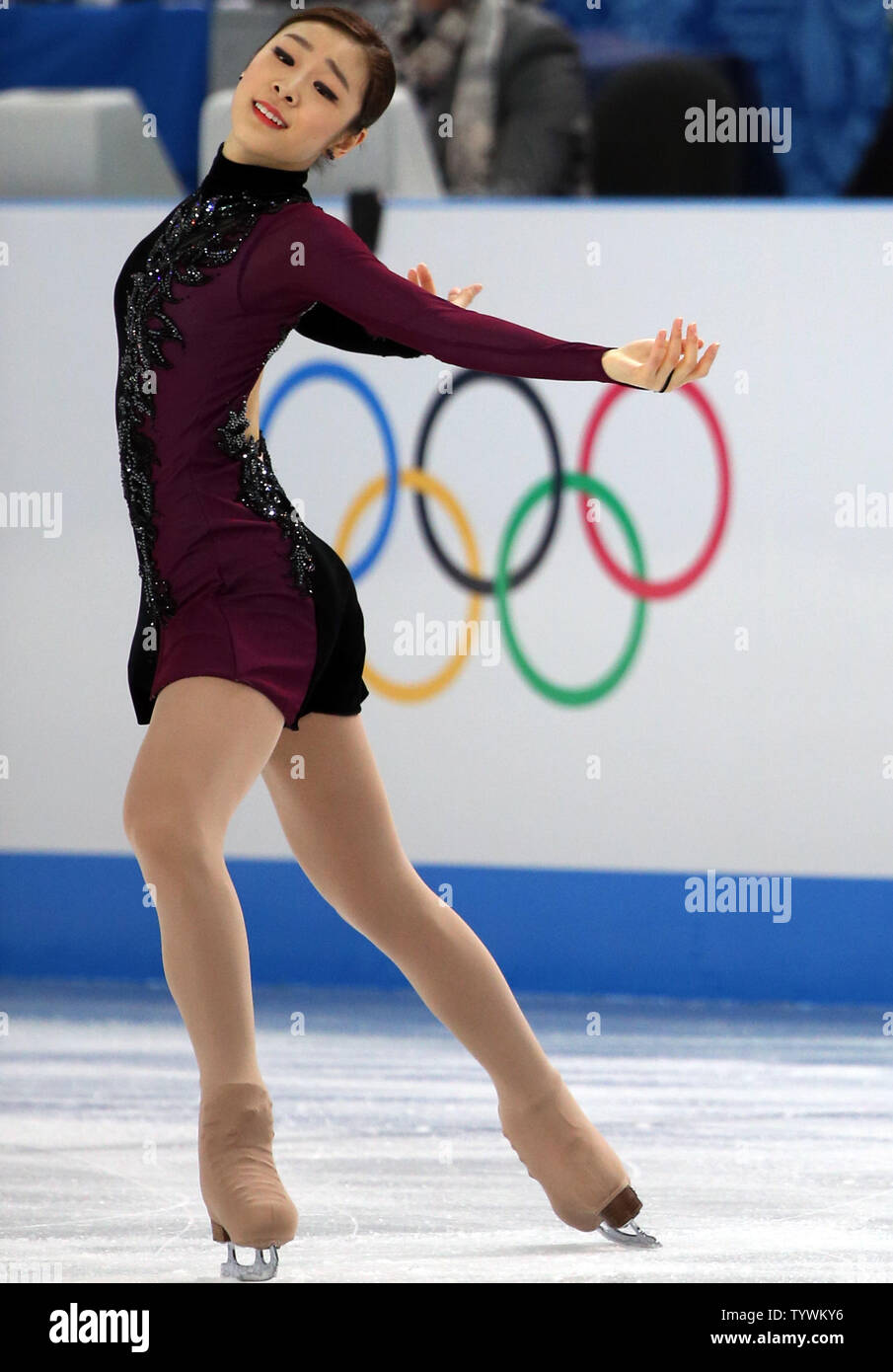 Korea's silver medalist Kim Yuna performs during the ladies' figure