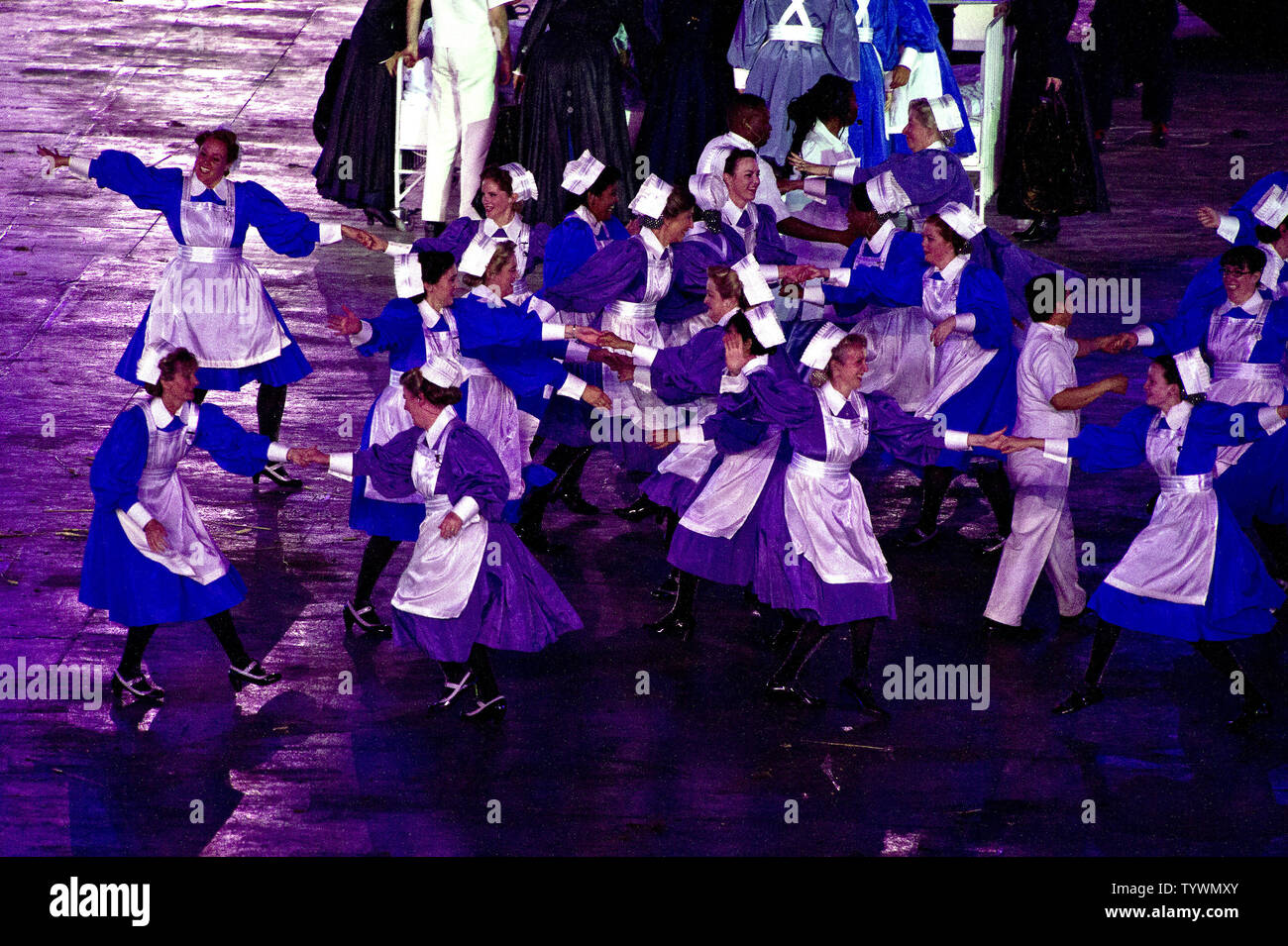 https://c8.alamy.com/comp/TYWMXY/performers-dressed-as-nurses-dance-in-celebration-of-the-british-national-health-service-nhs-during-the-opening-ceremony-at-the-london-2012-summer-olympic-games-on-july-27-2012-in-london-upiron-sachs-TYWMXY.jpg