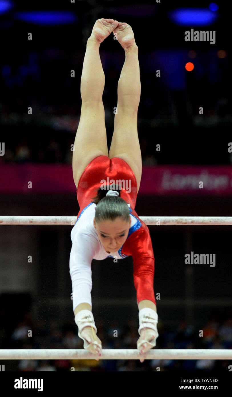Russia S Aliya Mustafina Performs Her Routine On The Uneven Bars