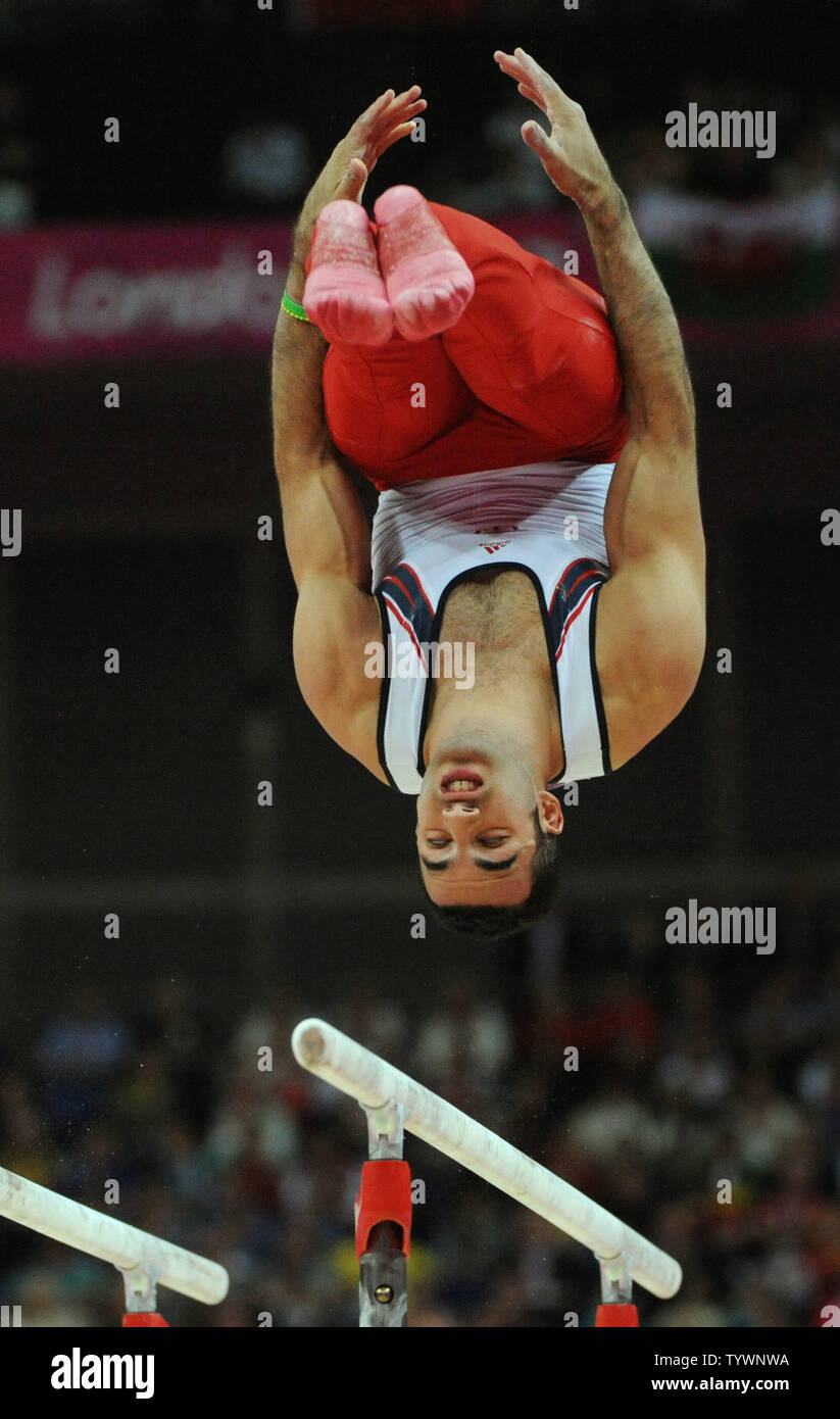 Usa S Danell Leyva Flips In His Routine On The Parallel Bars At The Men S Gymnastics Team Final Competition At The North Greenwich Arena During The London 12 Summer Olympics In Greenwich London